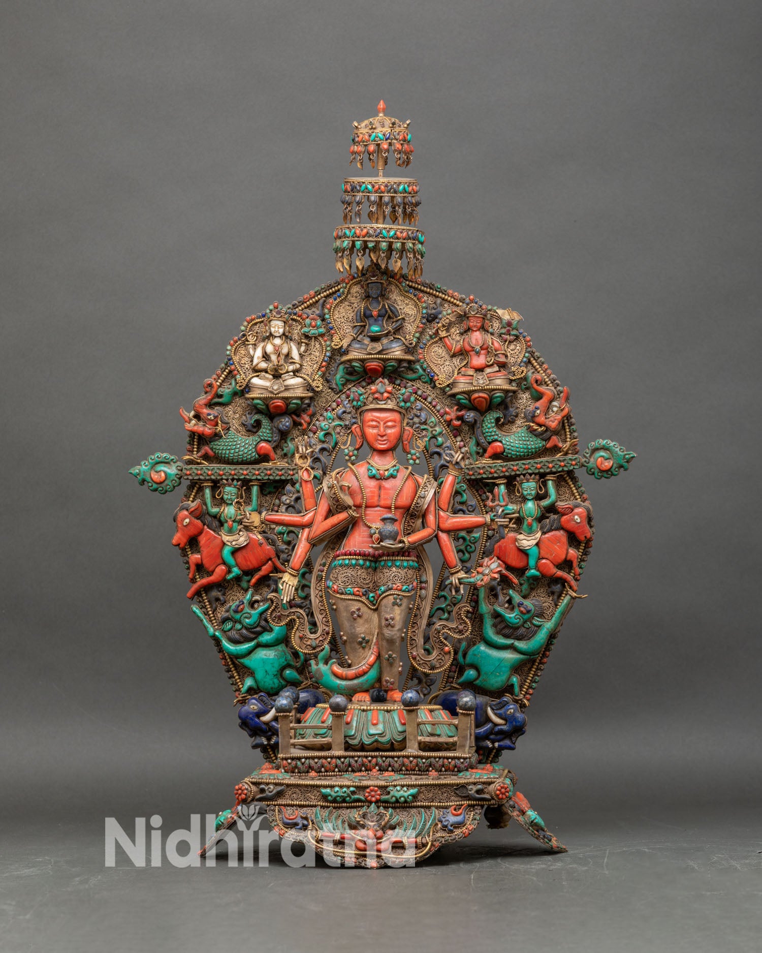 Coral Avalokiteshvara statue front view, six-armed Chenrezig with gold gilding and gemstone inlay
