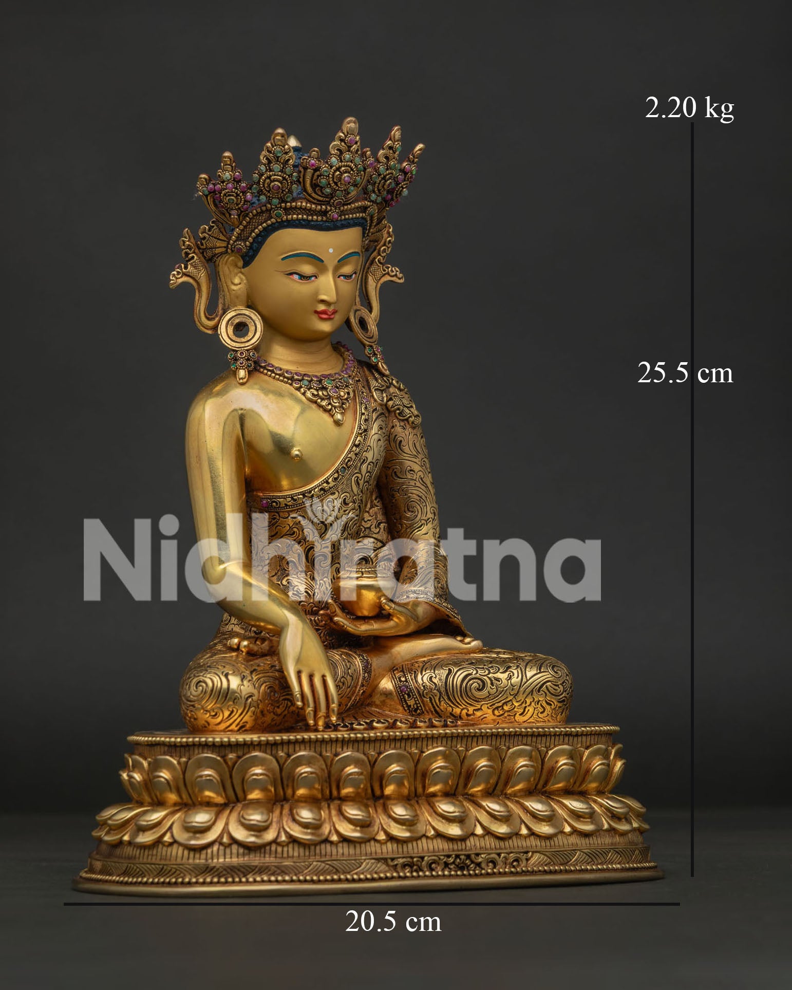 crowned shakyamuni buddha statue right side view with lotus pedestal and ornate robes