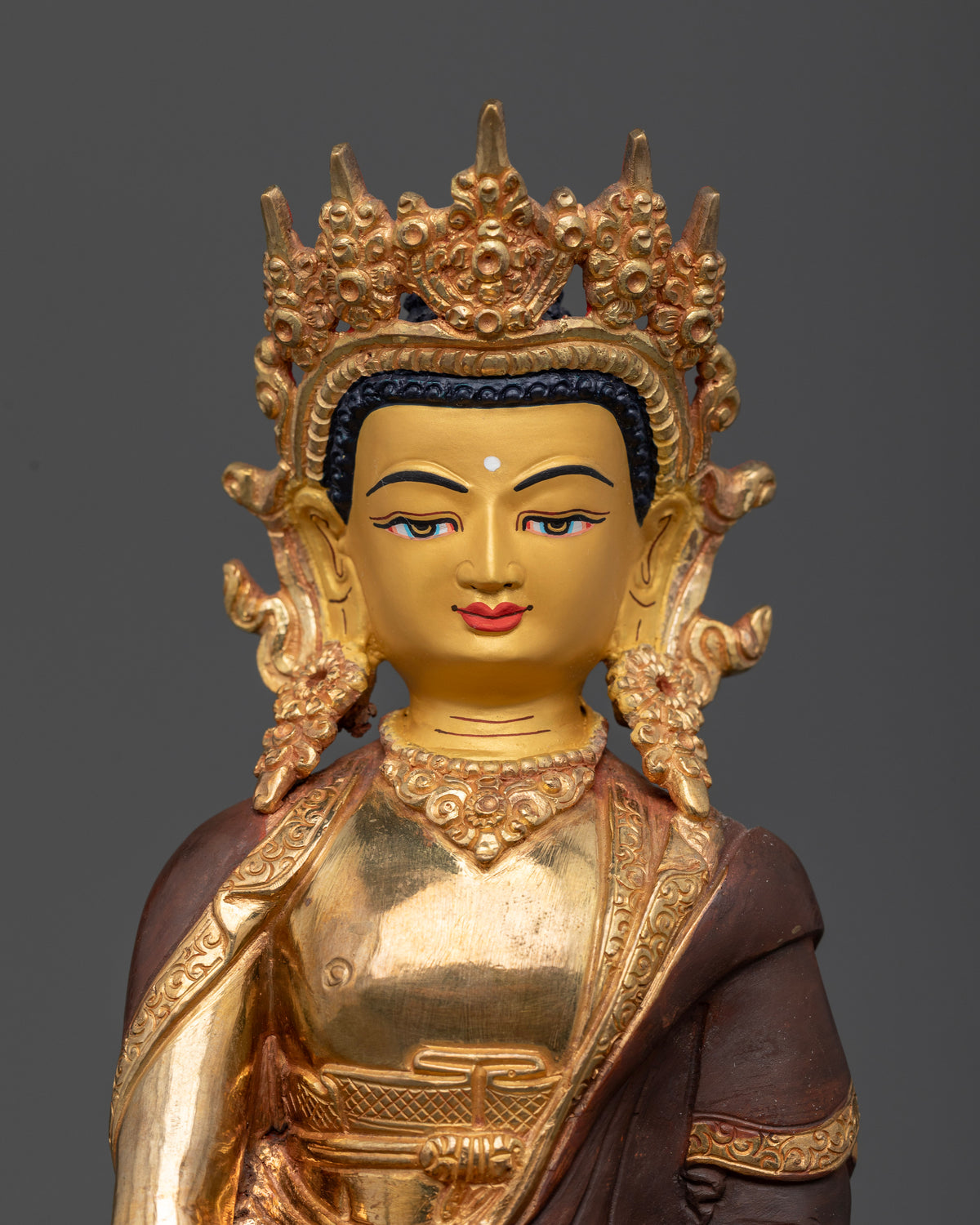 Crowned Shakyamuni Buddha statue with 24K gold painted face.
