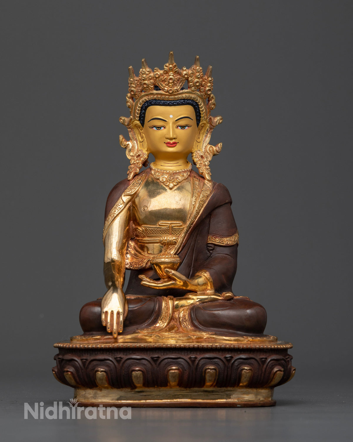 Crowned Shakyamuni Buddha statue with half gold fire gilded and oxidized finish.