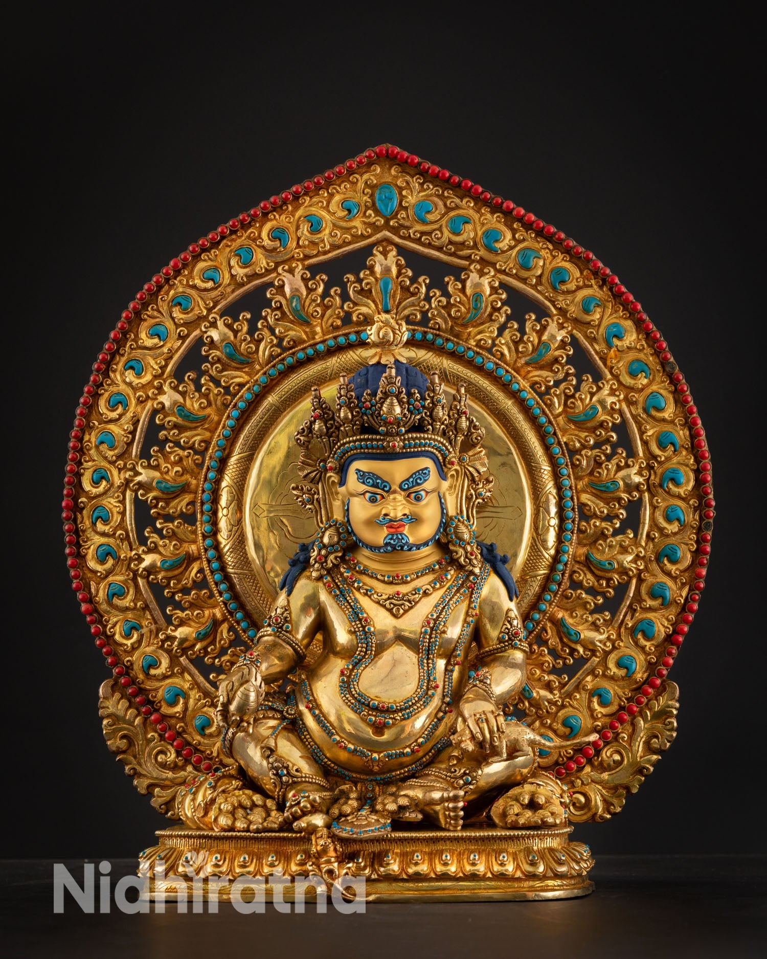 Detail Dzambhala statue, wealth prosperity symbolism, Nepal