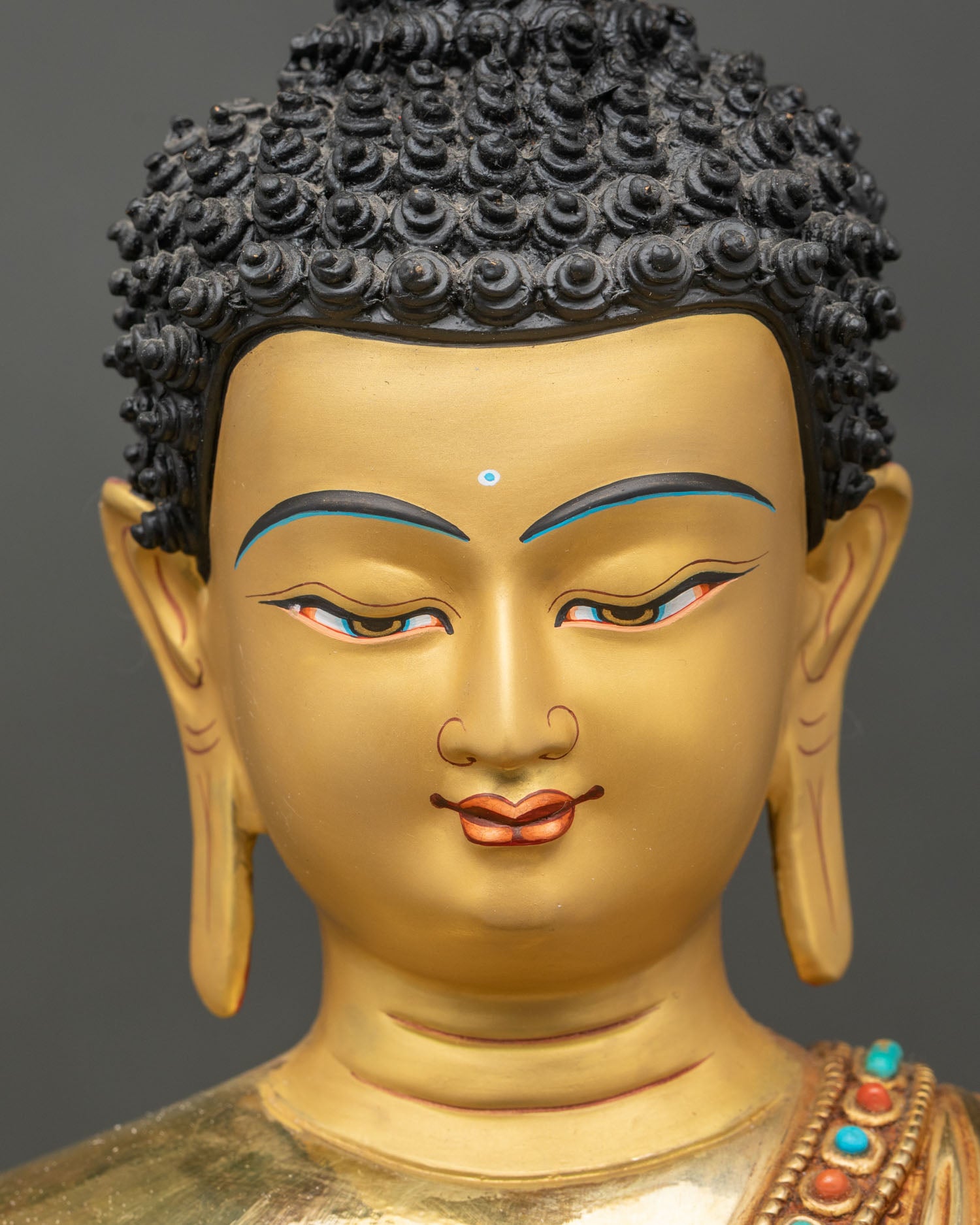 Detailed close-up of Amitabha Buddha face, serene expression, 24K gold fire-gilded