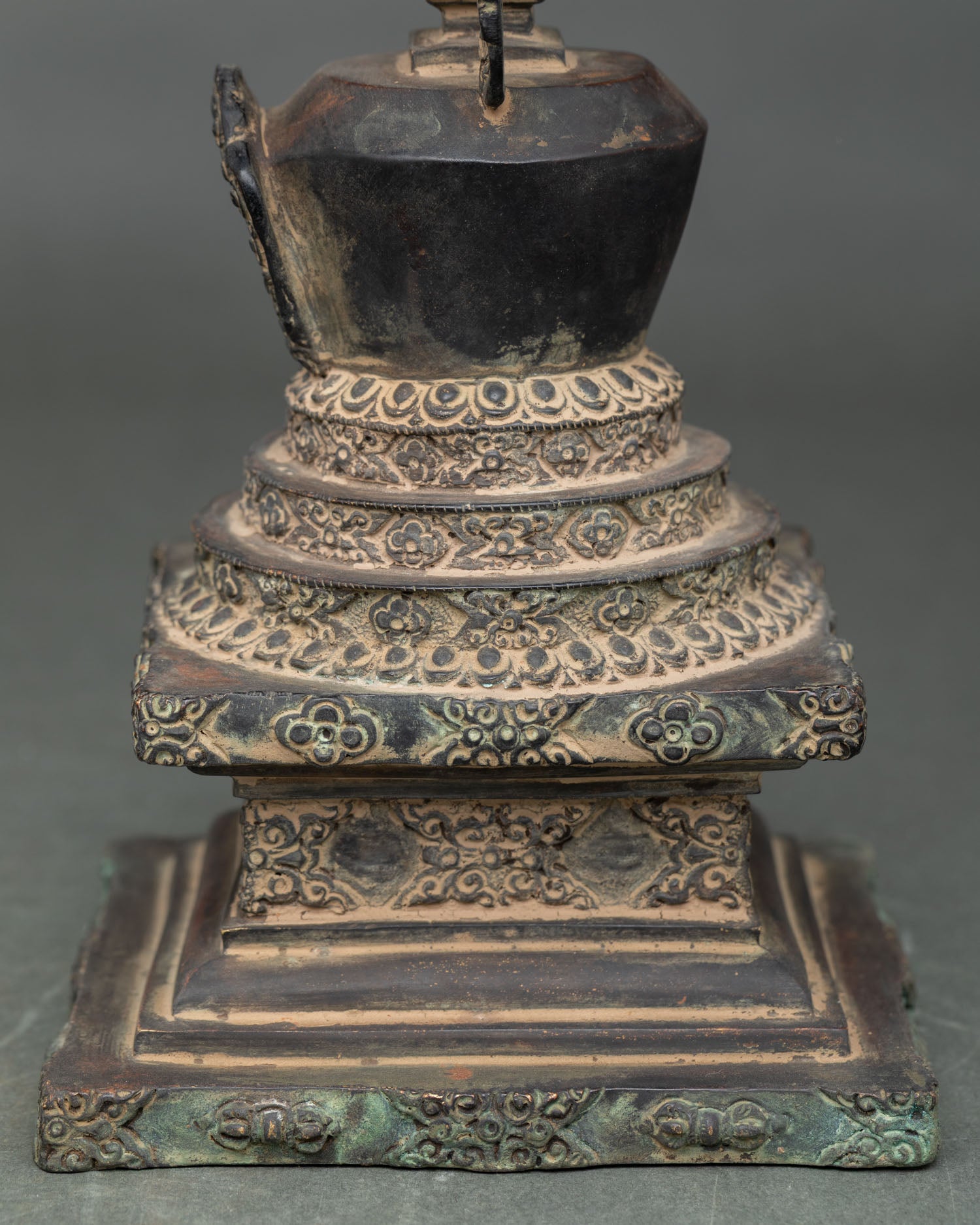 Detailed Namgyalma Stupa carving showing traditional Nepalese metal craftsmanship