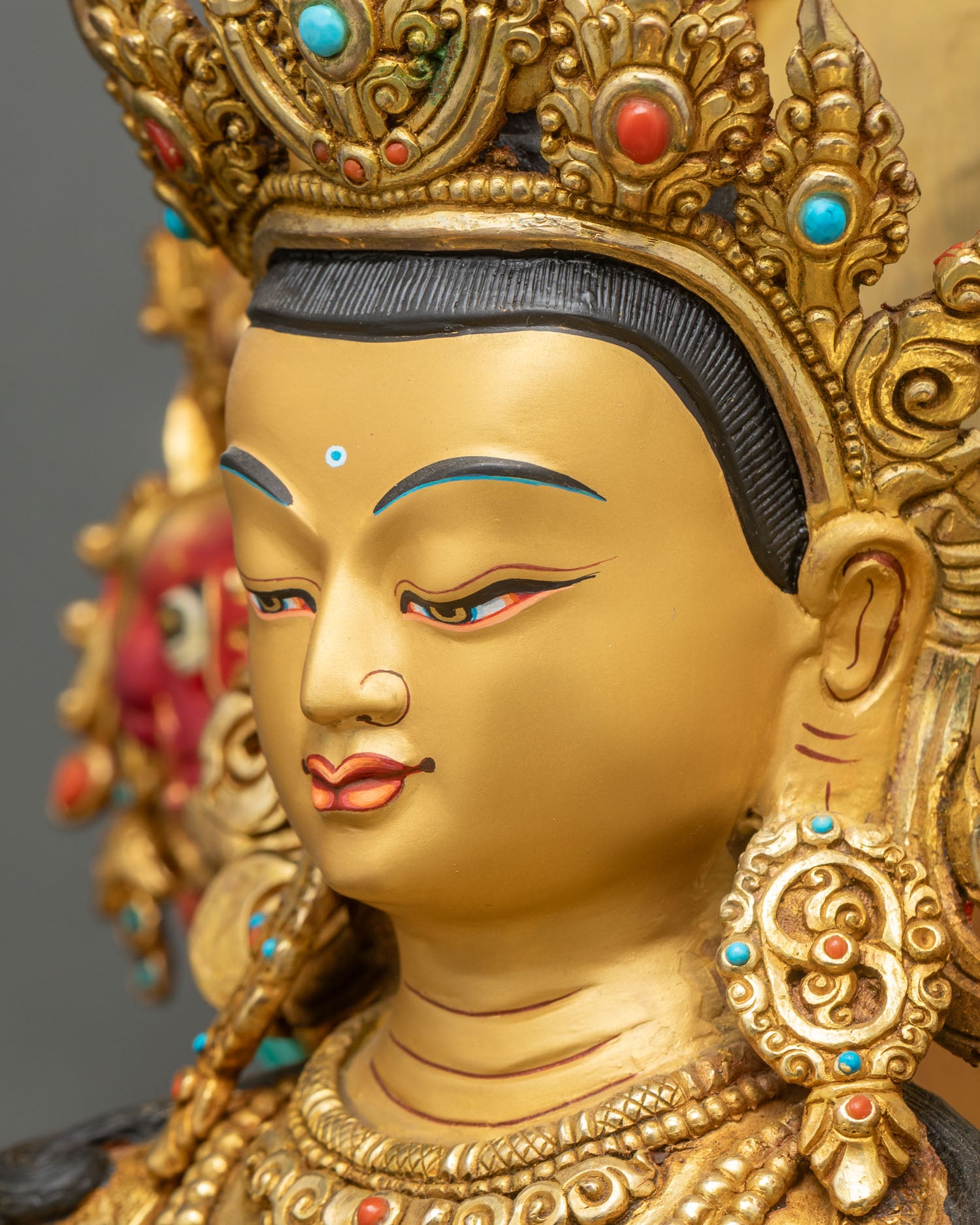 side profile of manjushri face, fire-gilded gold, serene expression