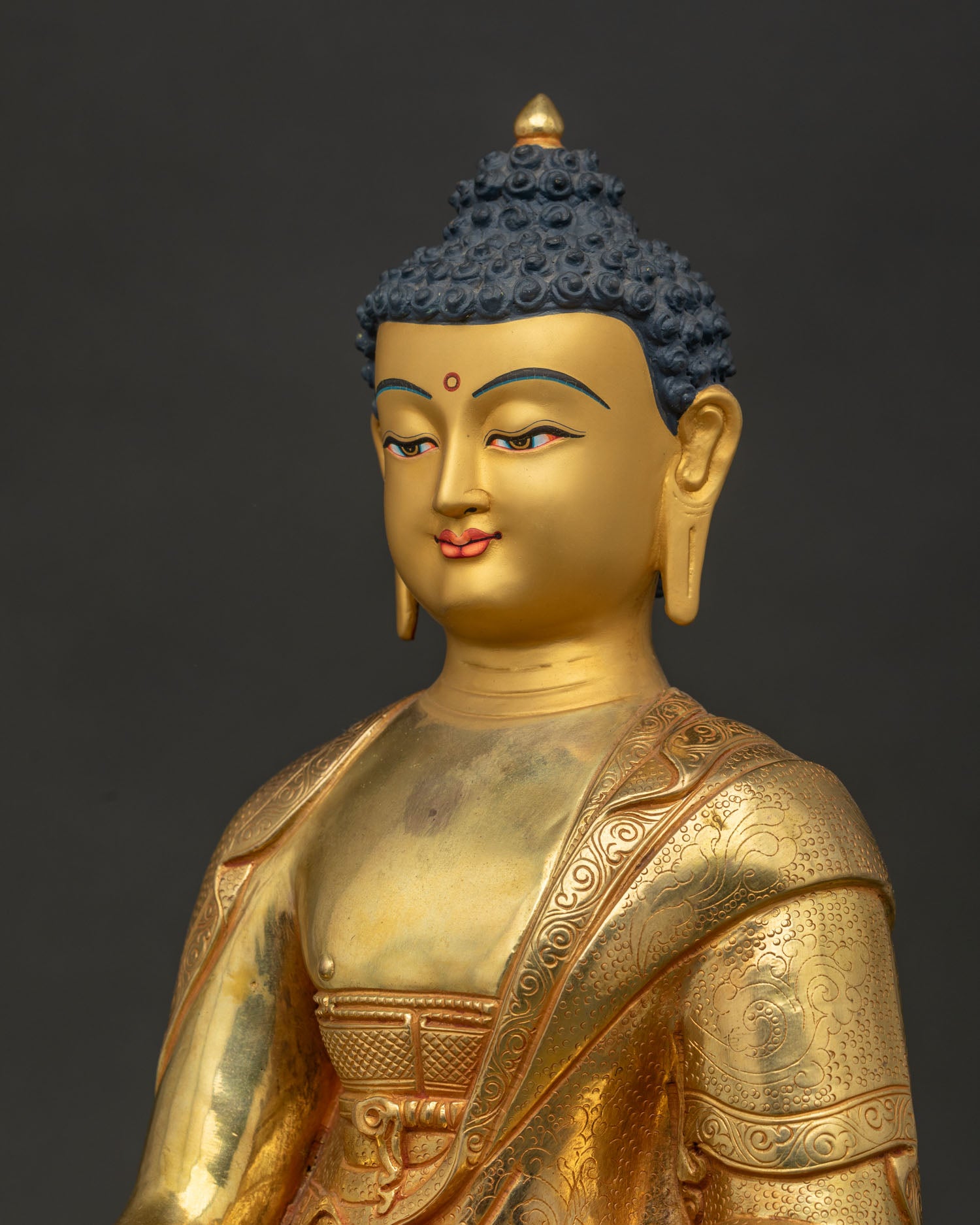 Detailed side close-up of 24K gold-gilded Shakyamuni Buddha Statue craftsmanship