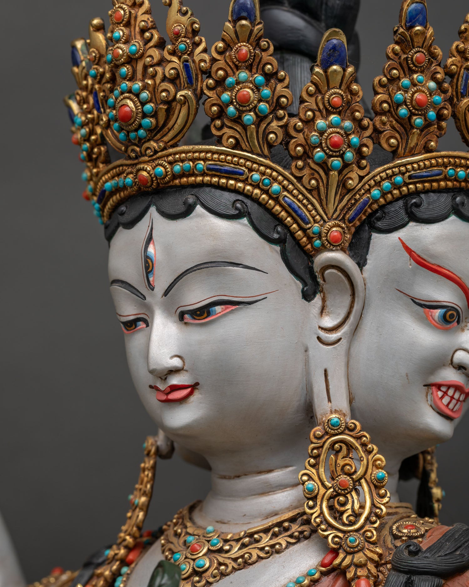 detailed side close up of namgyalma face with vibrant acrylic colors and jeweled crown