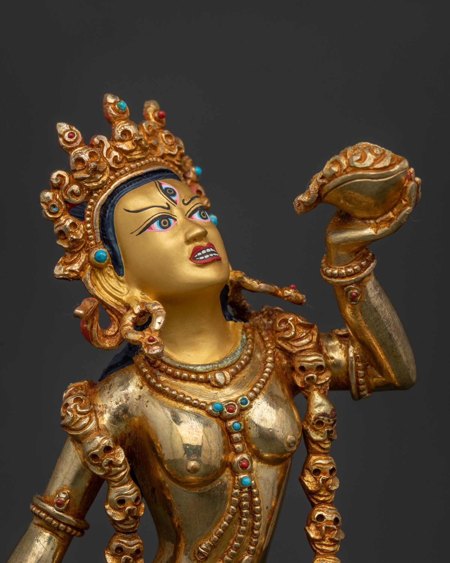 Detailed Vajrayogini Face with Skull Garland and Semi Precious Stone Adornment.
