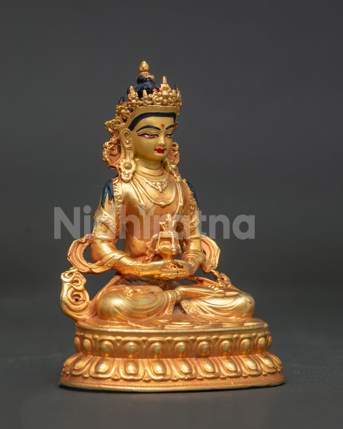 Detailed view of Amitayus Buddha statue holding sacred vase in Dhyana Mudra.