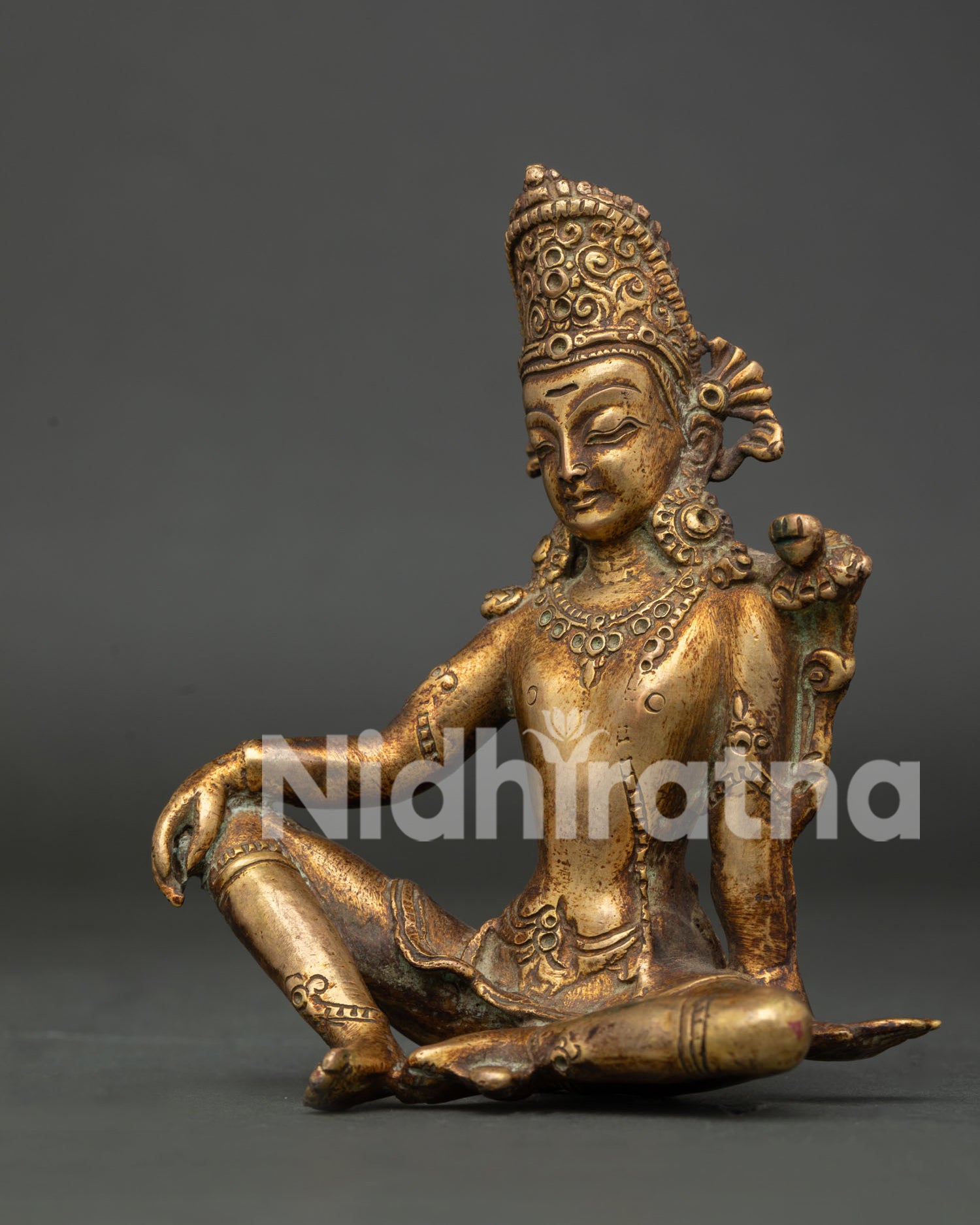 Detailed View of Gold Fire Gilded Indra Statue Holding Utpala Flower.