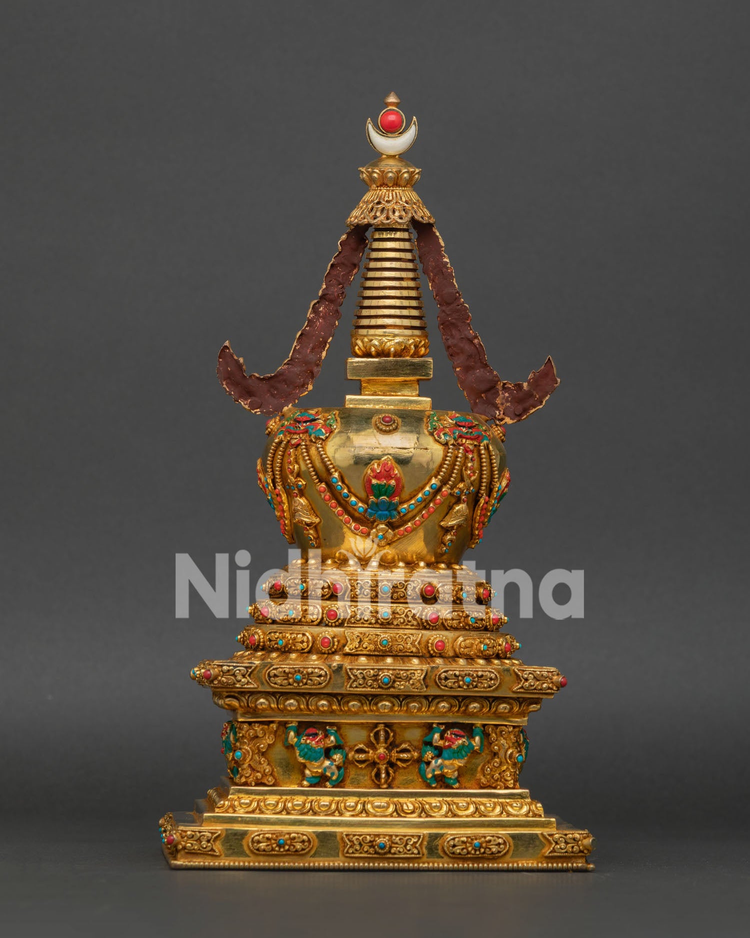 Detailed View of Gold-Plated Buddhist Stupa with Double Vajra Base Design
