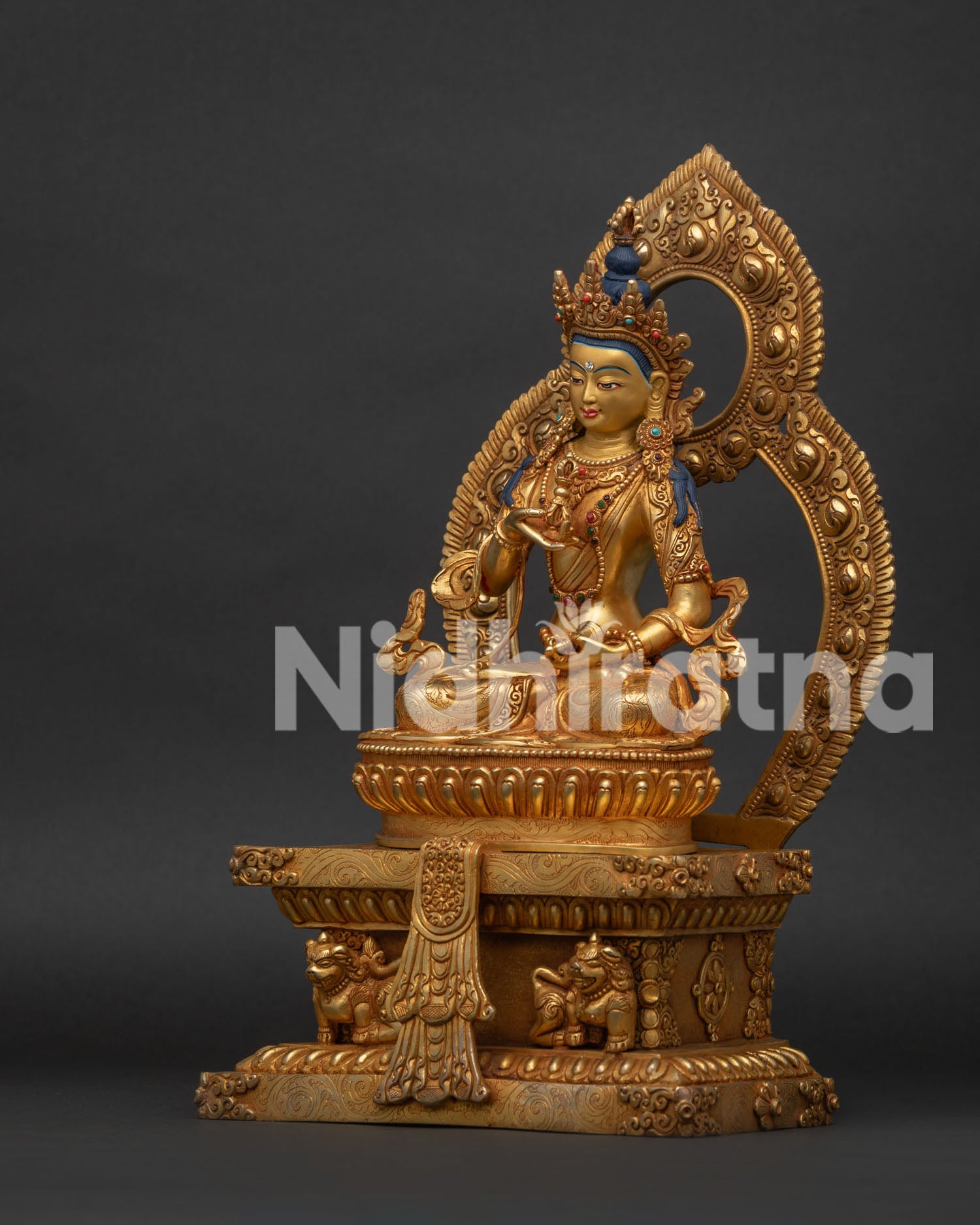 Detailed View of Vajrasattva Holding Vajra Bell and Floral Robes.