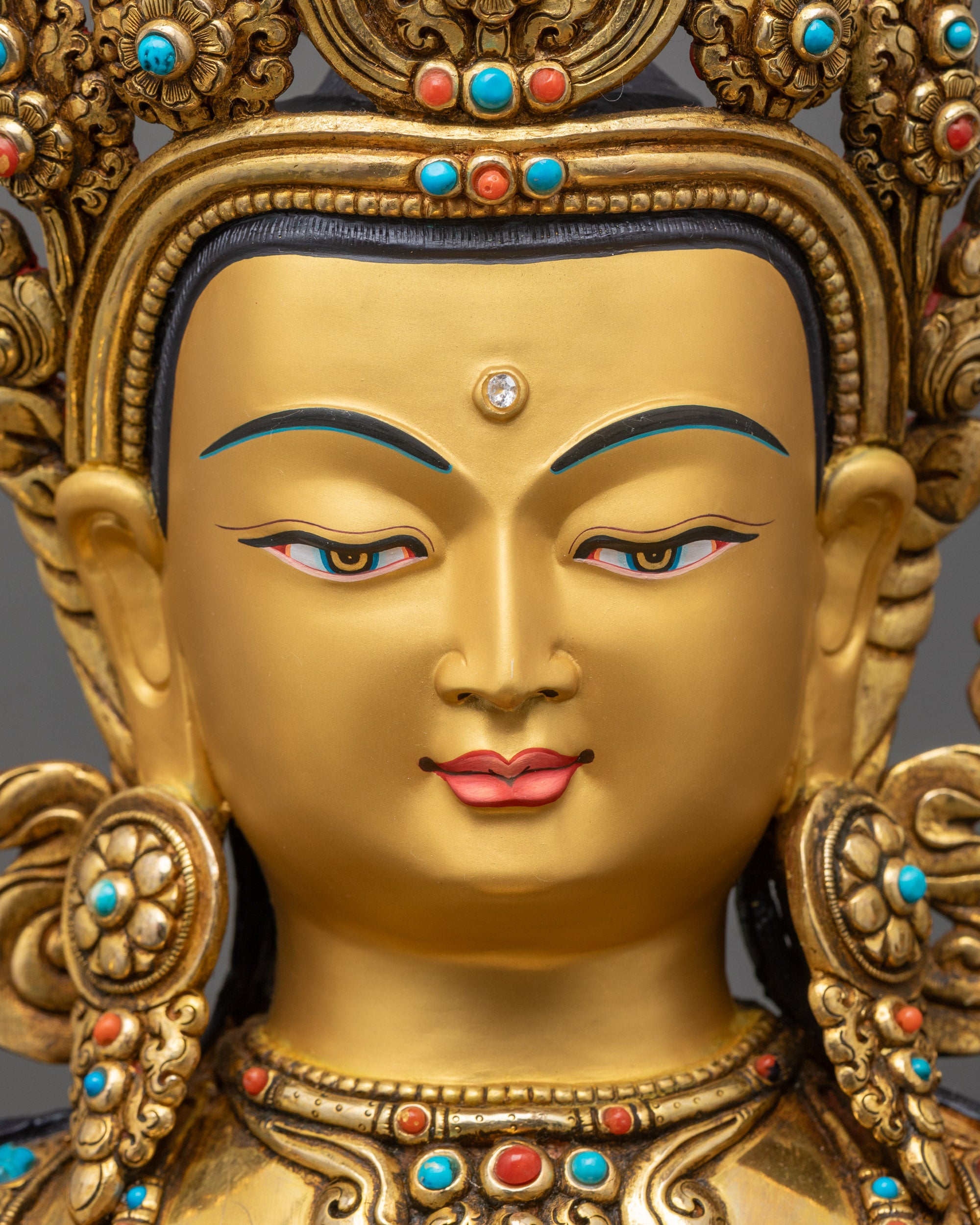detailed close up face of Premium Manjushri Statue with serene expression and wisdom flame sword