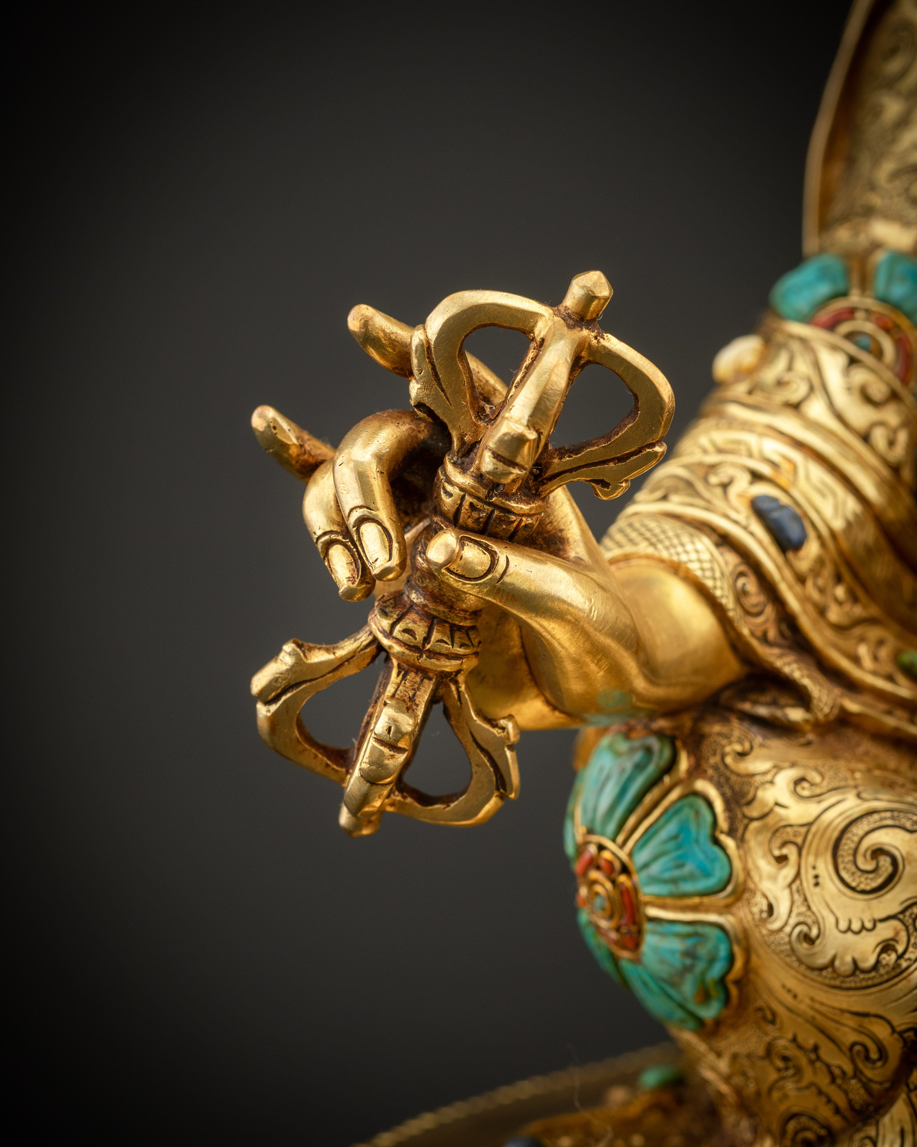 detailed shot of vajra Padmasambhava statue gold gilded Guru Rinpoche Himalayan art