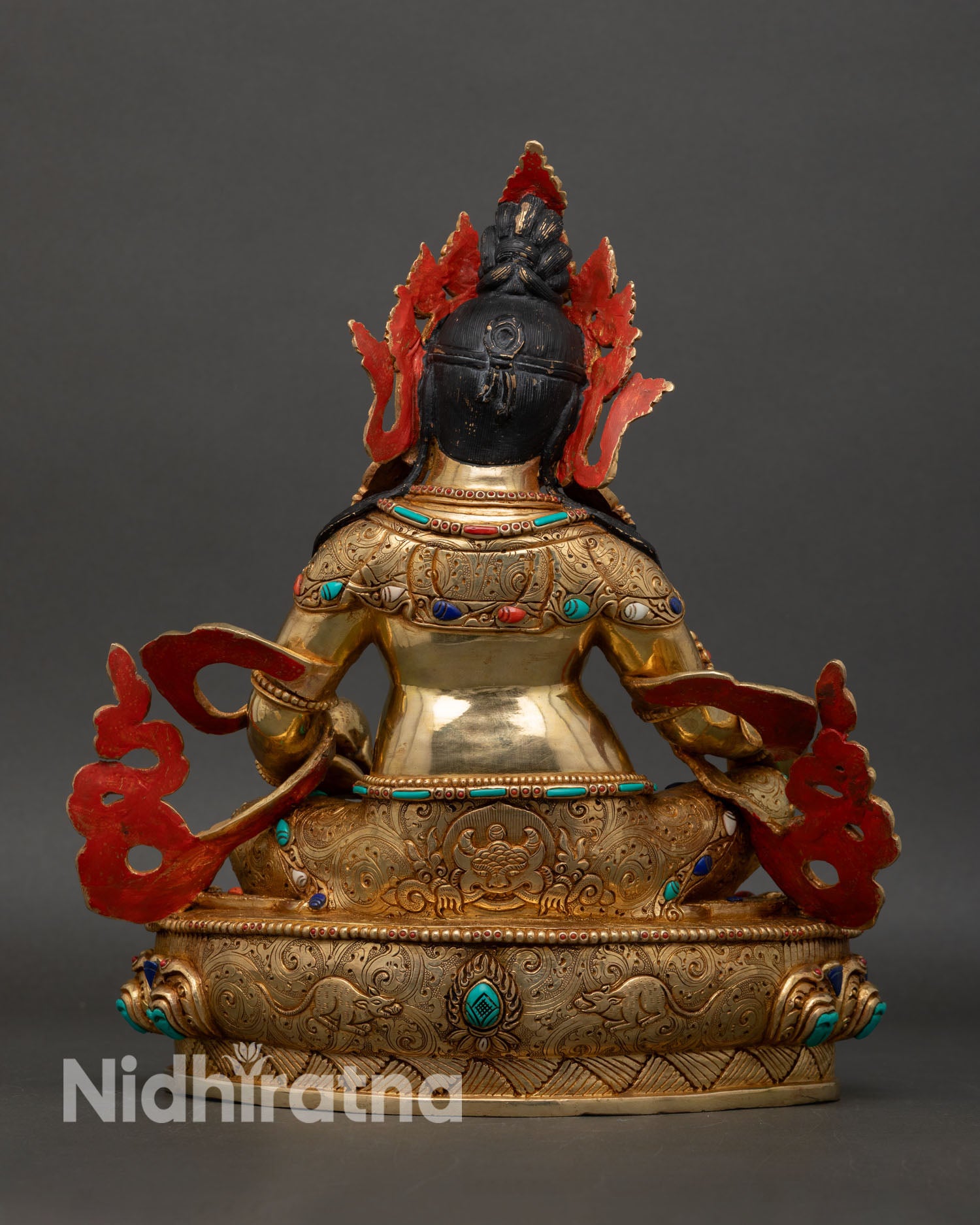 Dzambhala back view handmade Nepal sculpture detailed lotus base ritual jewelry spiritual wealth deity sacred altar statue