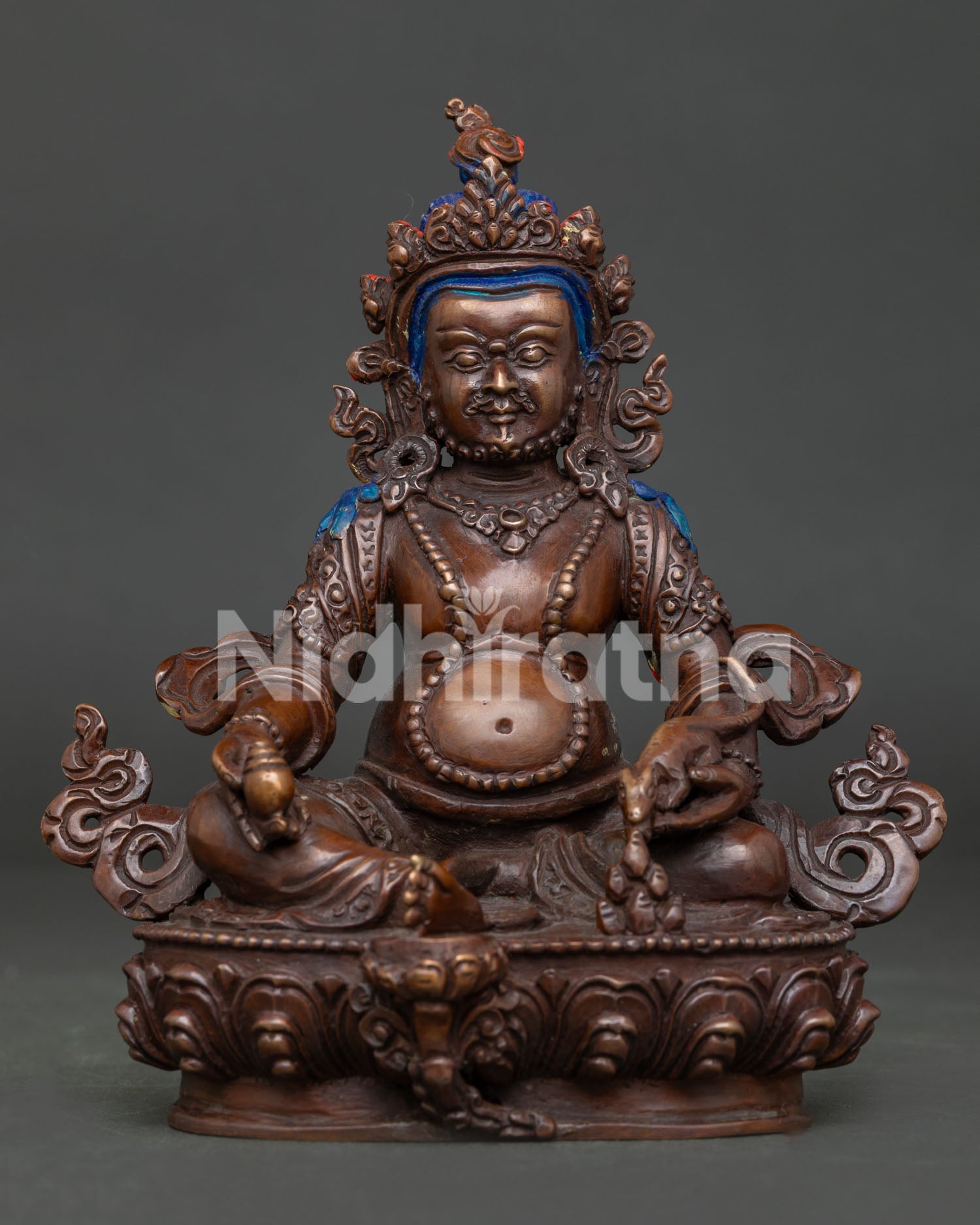 Dzambhala Buddhist deity handcrafted in Nepal with oxidized copper and traditional Newari craftsmanship