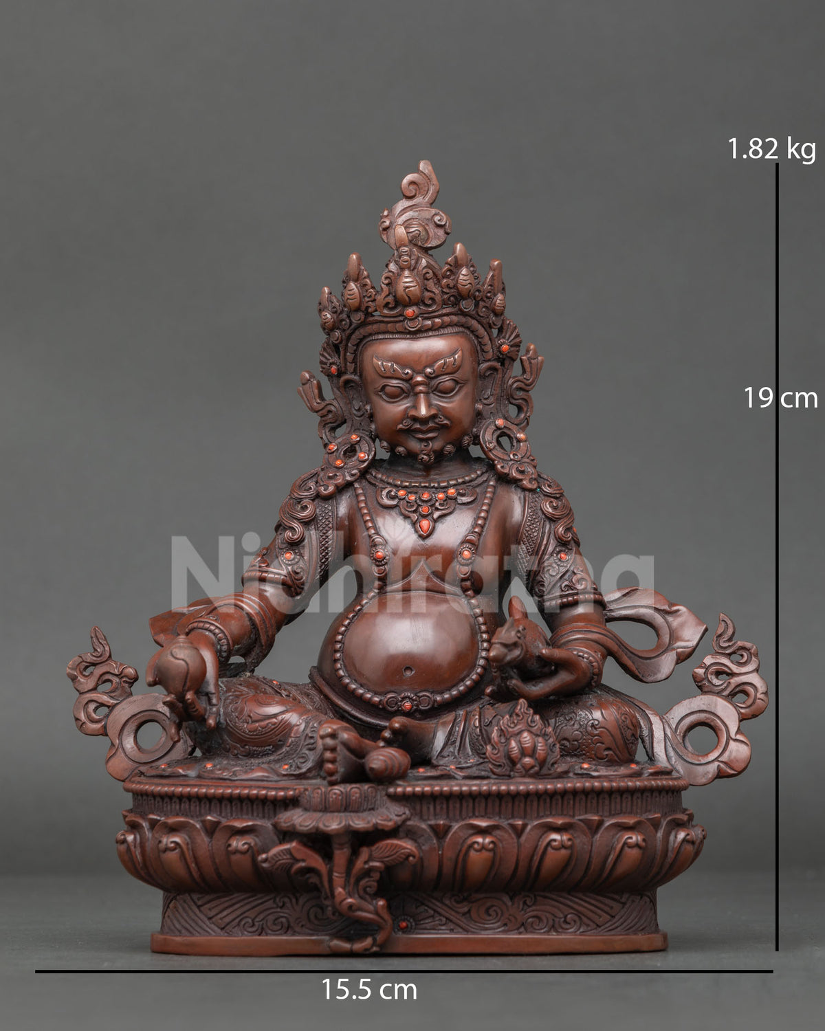 Dzambhala buddhist statue handcrafted by newari artists from patan nepal in copper with oxidized finish.