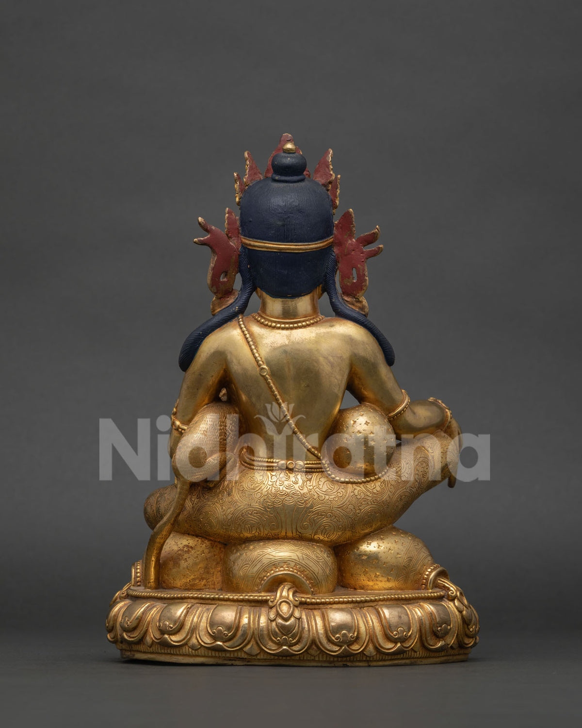 Dzambhala Statue back view showing crown, hair and lotus base detailing