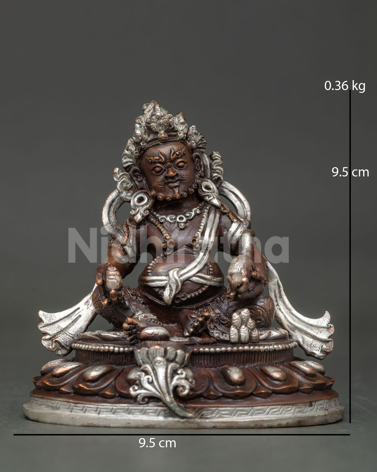 Dzambhala statue chemically oxidized copper with silver plated details.