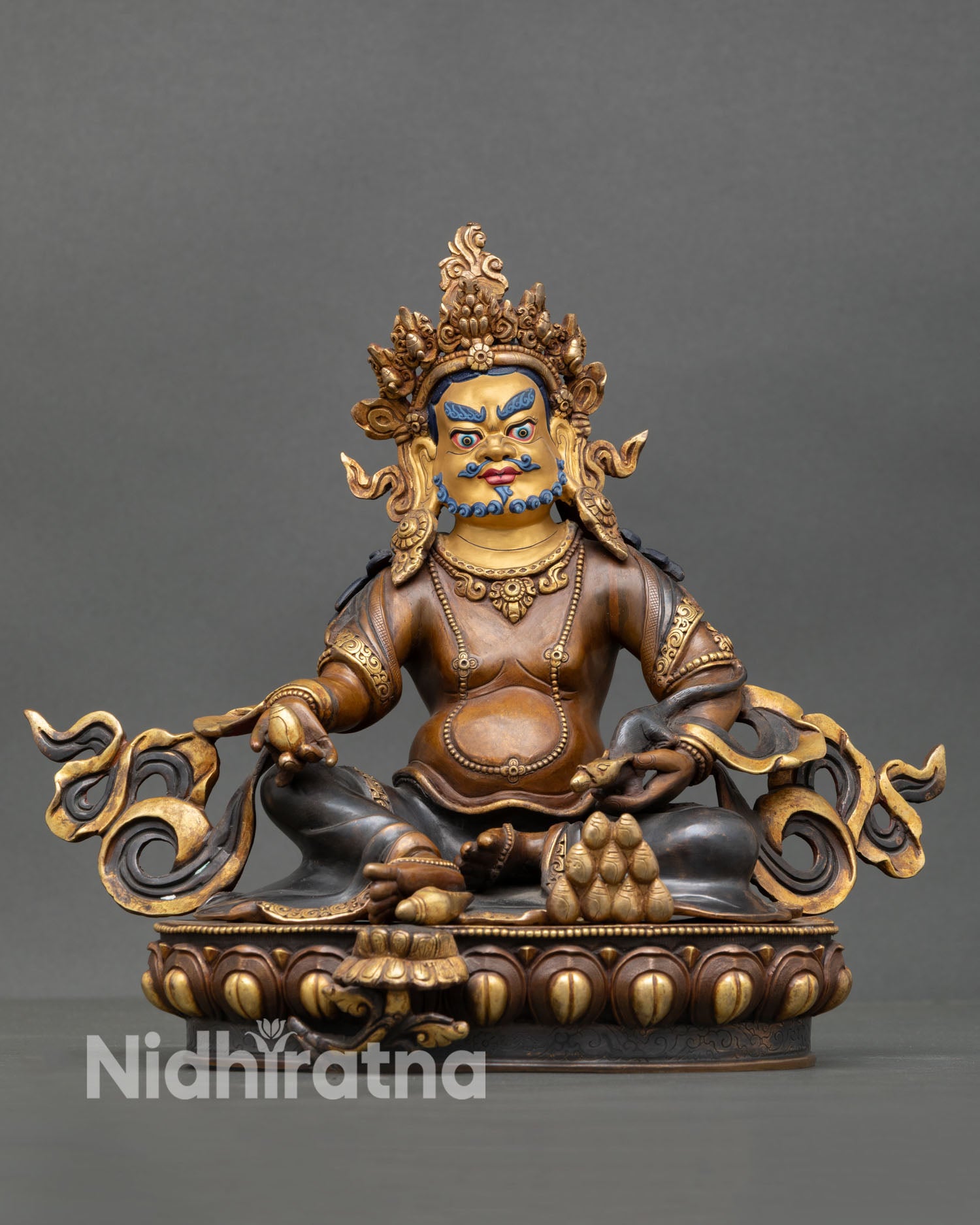Dzambhala statue front view wealth deity copper oxidized finish gold painted face Nepal Newari artisan lotus pedestal altar sculpture