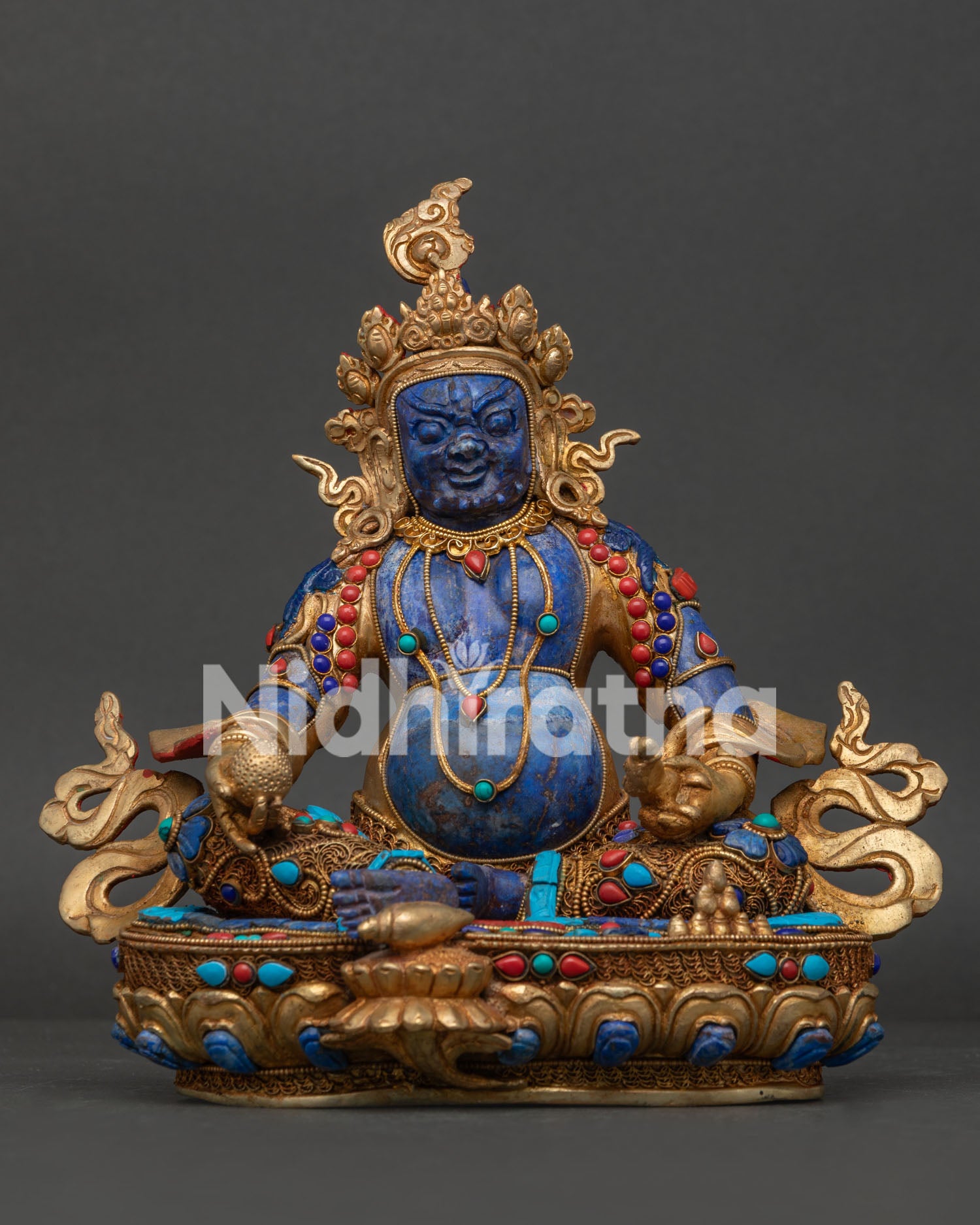 Dzambhala Statue front view with semi precious lapis lazuli body, gold gilded copper and gemstone details