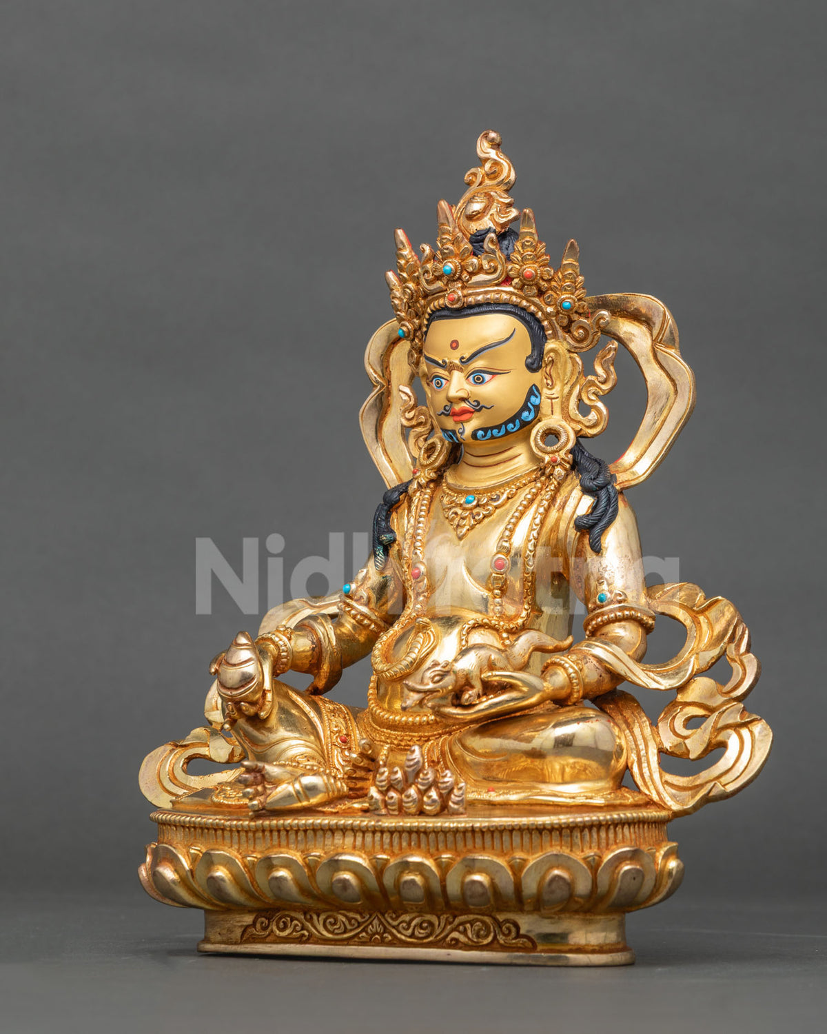 Dzambhala statue left side view Chintamani jewel silk garment.