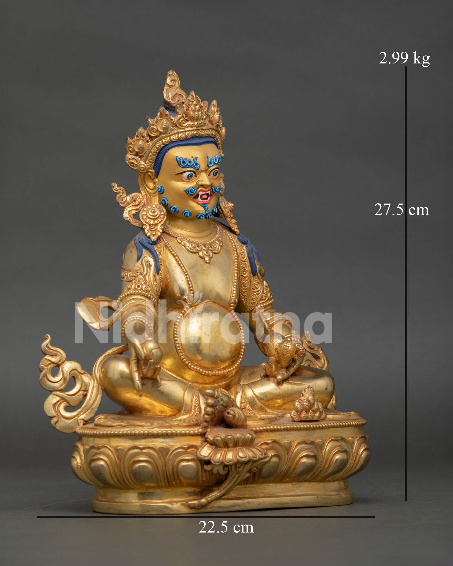 Dzambhala statue, seated on lotus pedestal, holding mongoose and citron fruit symbolizing prosperity