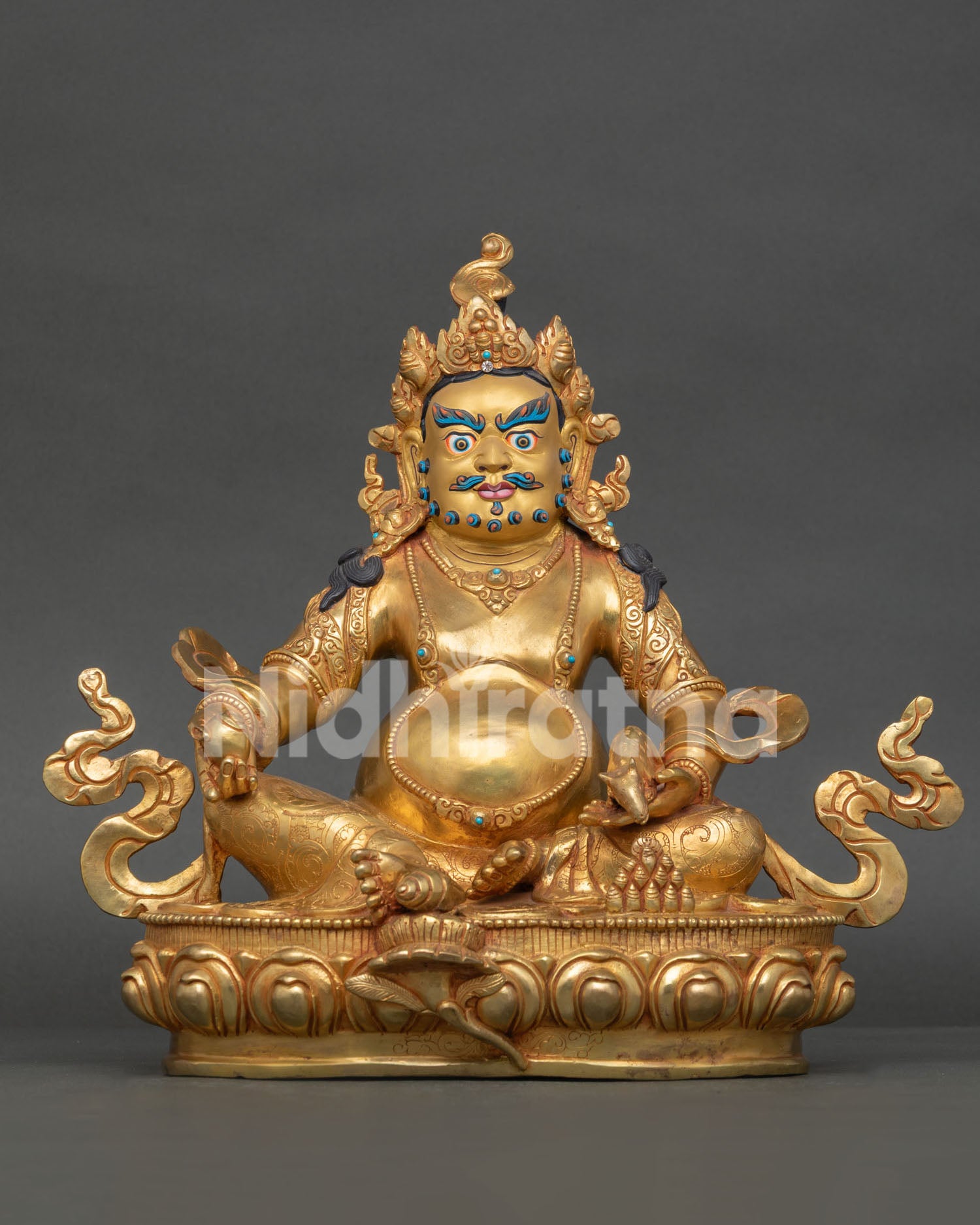 Dzambhala statue with 24K gold fire gilding, gold painted face, and semi precious stones from Nepal