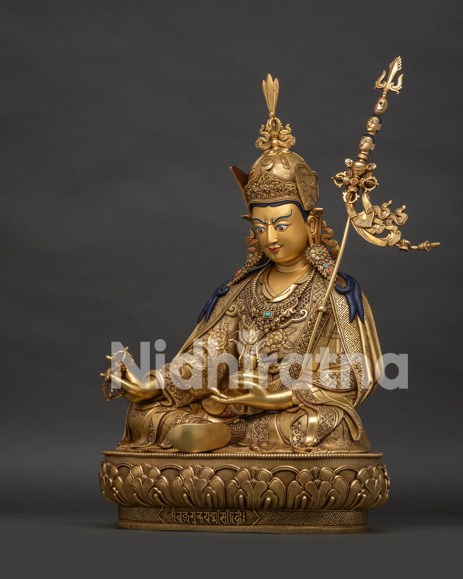 Left profile view of handcrafted 24K gold Padmasambhava statue