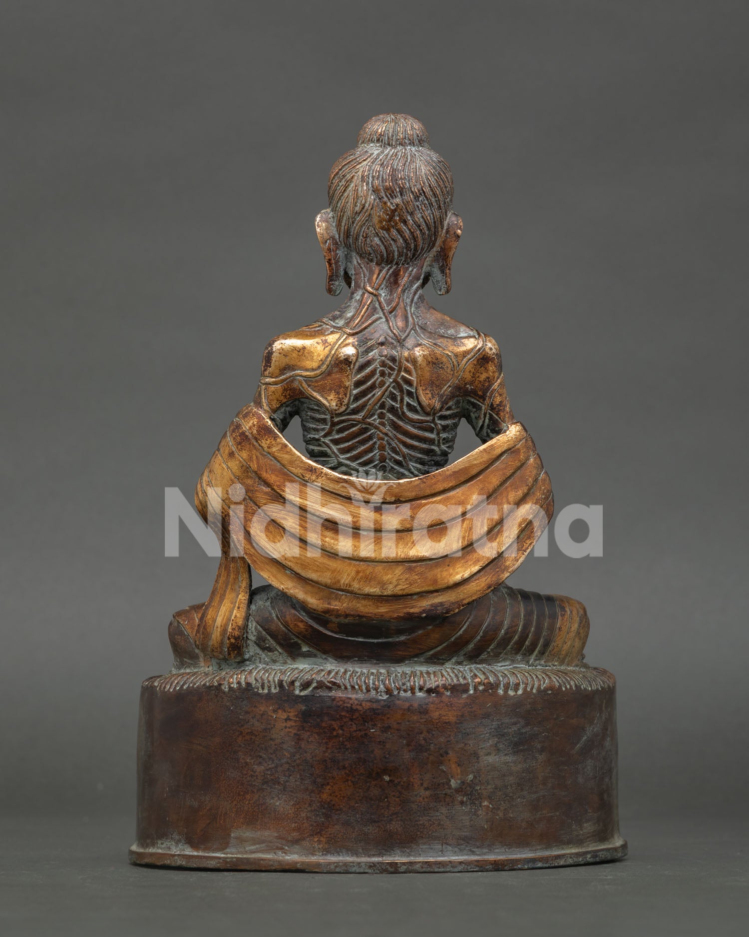 Fasting Buddha Statue Back View – Spine Detail and Robe Drape, Antique Copper Nepal