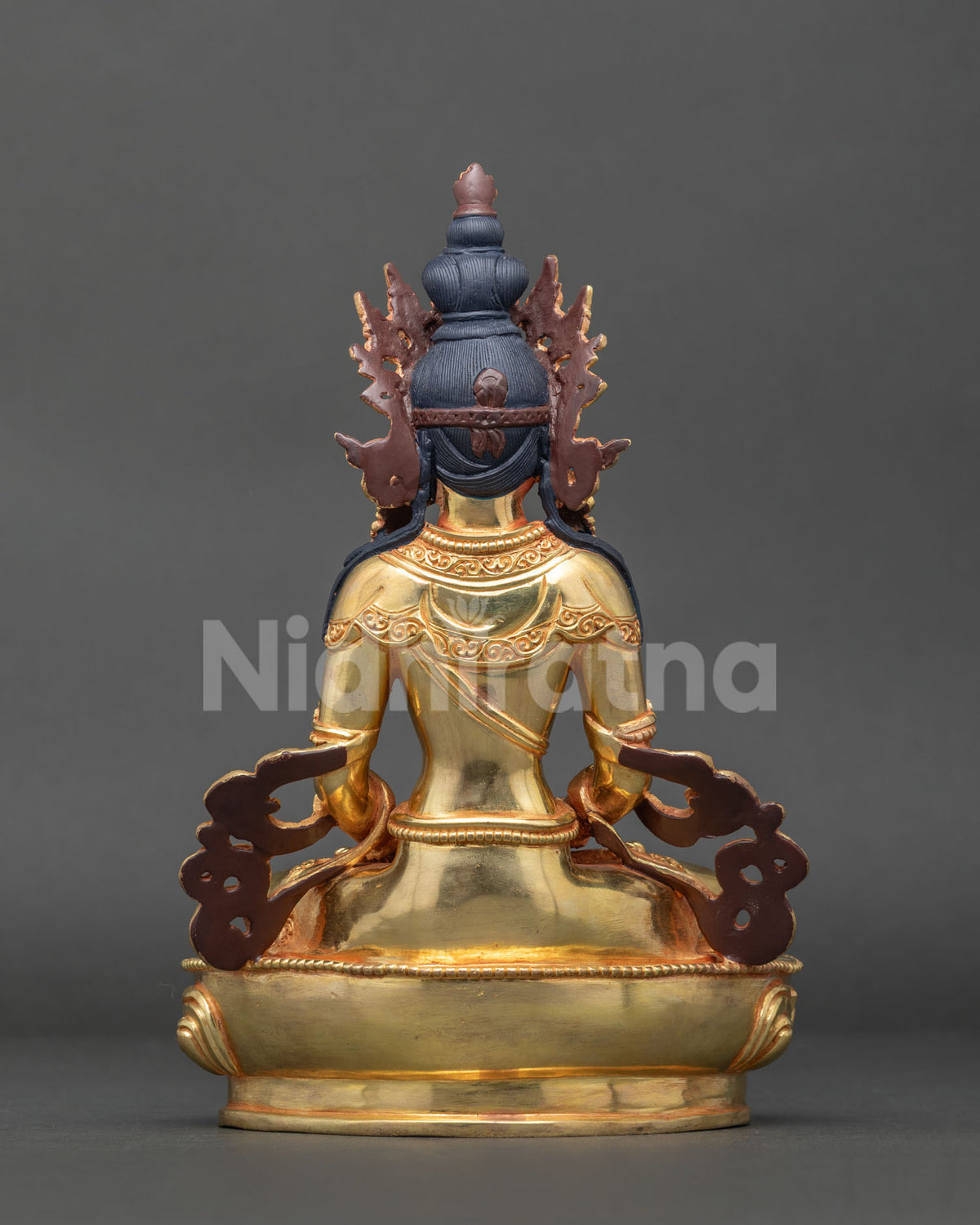 Finely crafted nepalese amitayus buddha statue with long life vase and ornate lotus pedestal.