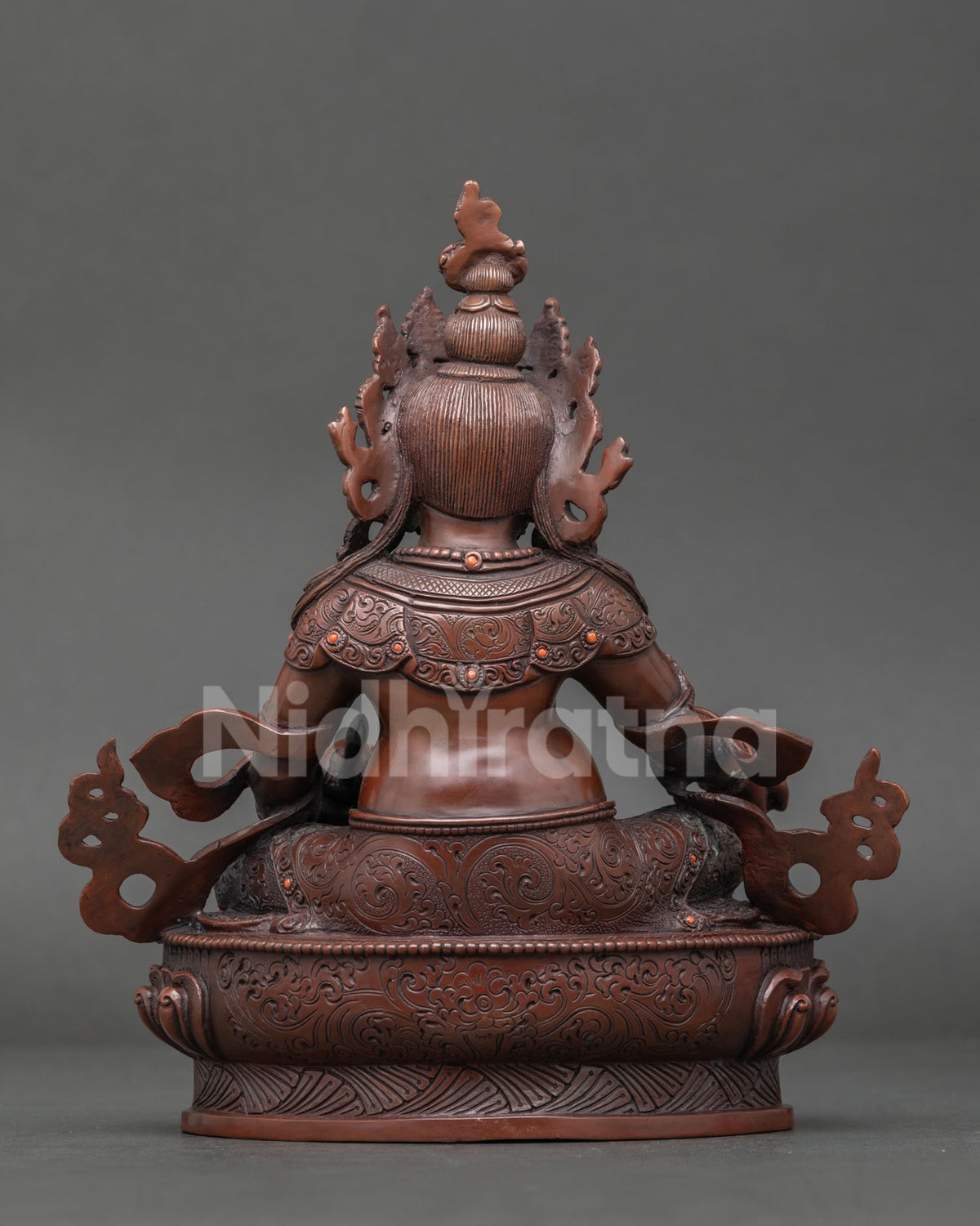 Finely crafted nepalese dzambhala statue for buddhist altar meditation space or personal shrine.