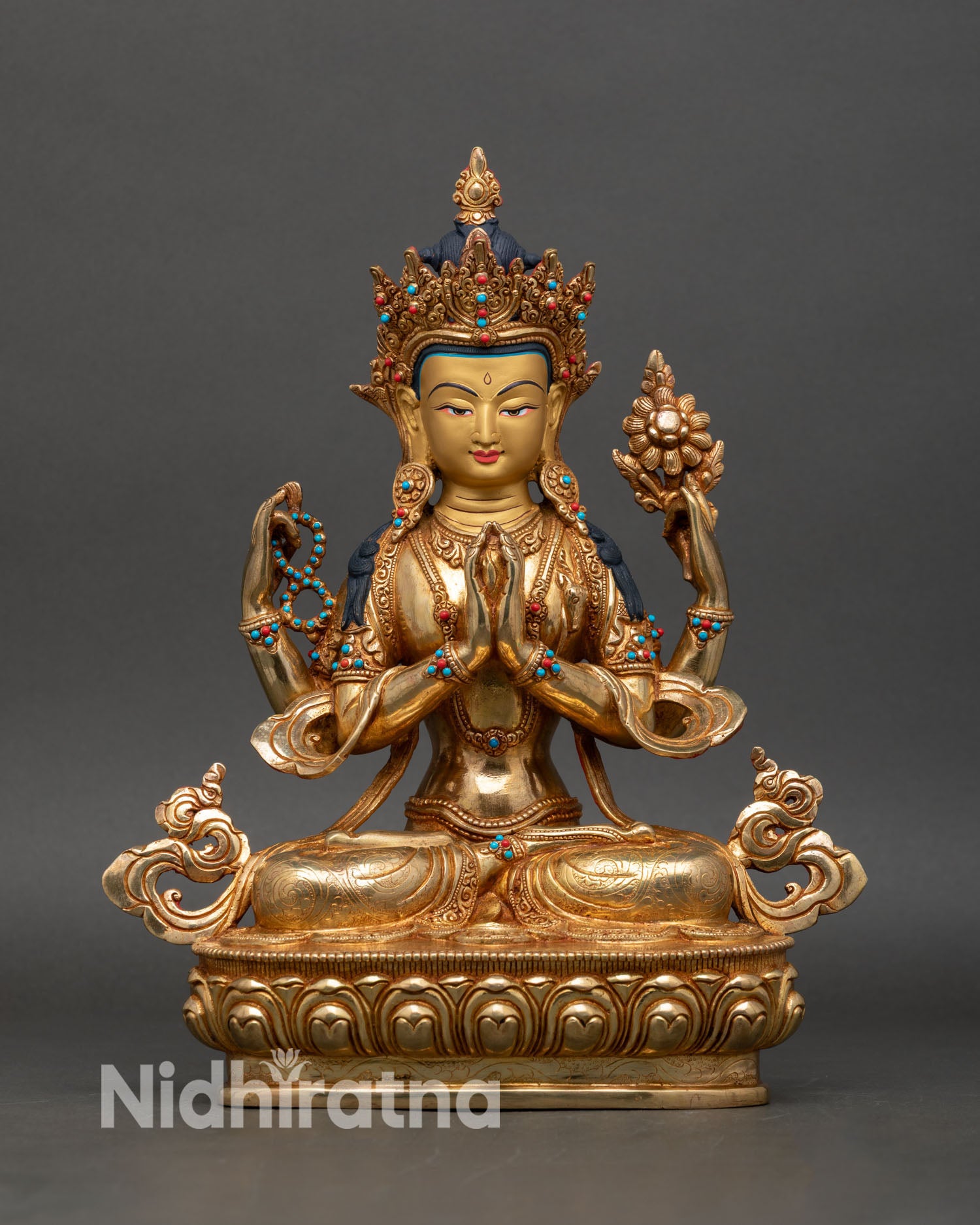 Four-armed Avalokiteshvara statue, lotus pedestal front view compassion deity tibetan buddhist art