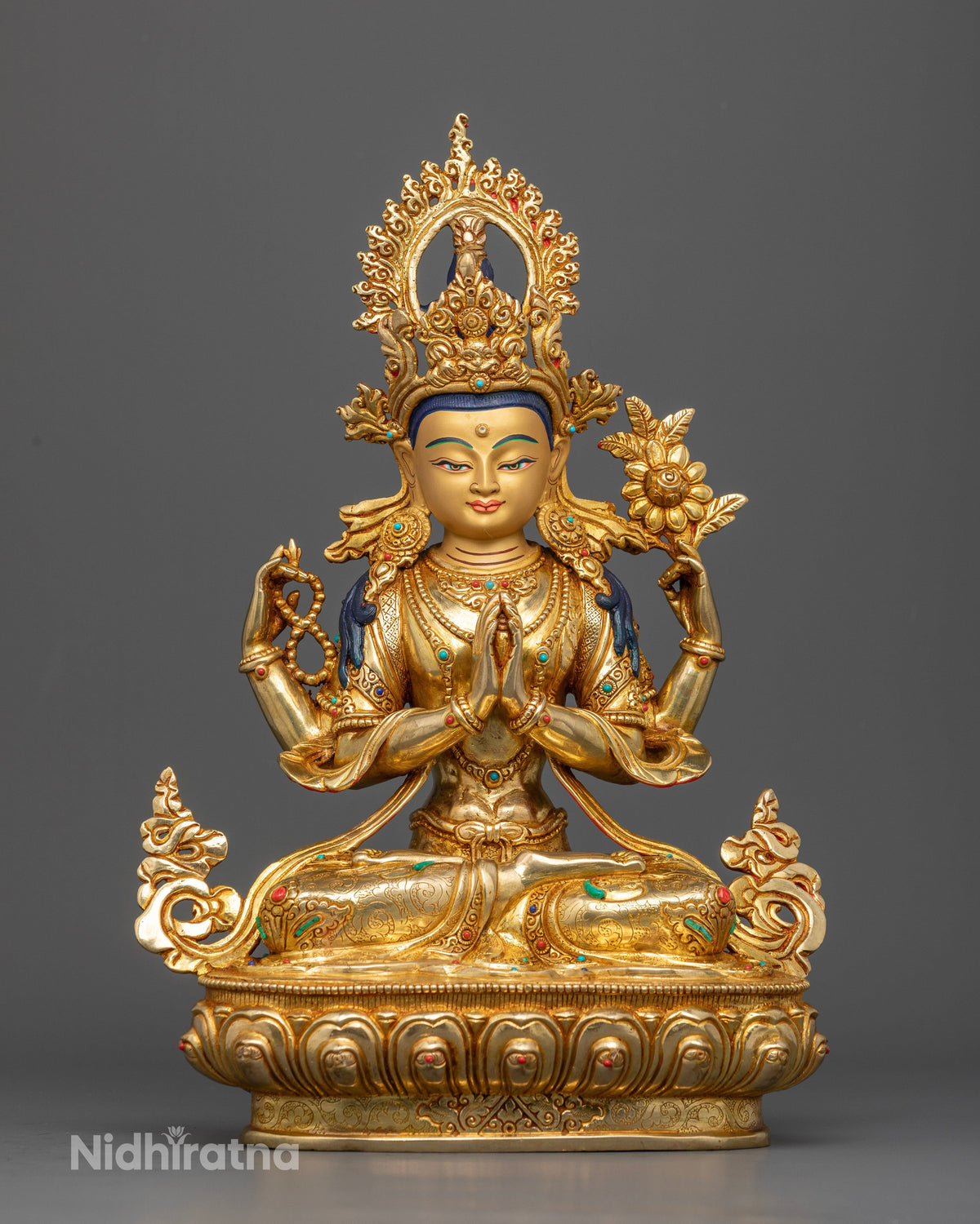 Four-armed Chenrezig statue handcrafted from copper with 24K gold gilding by Newari artisans in Patan, Nepal.