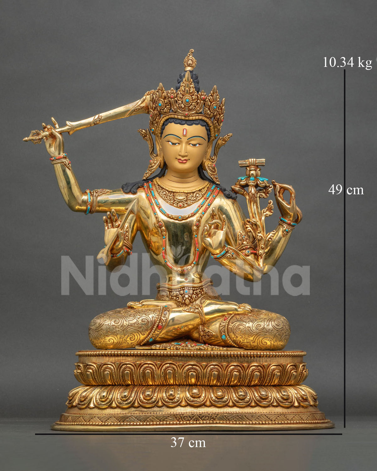 Four-armed Maha Manjushri statue front view, 24K gold fire-gilded copper on double lotus pedestal