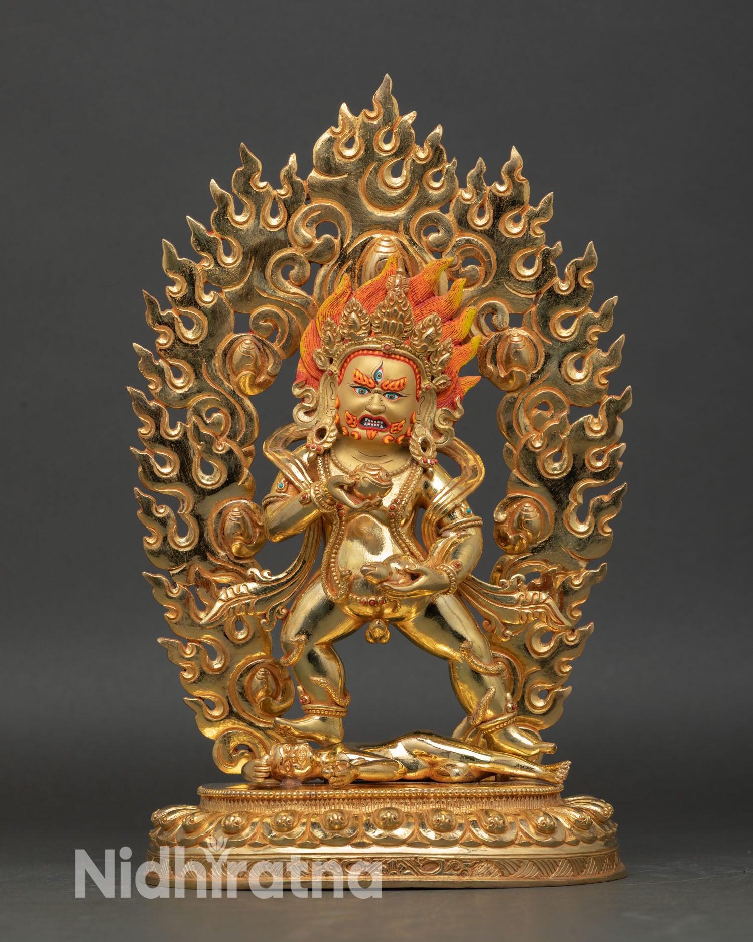 Front view of Black Dzambhala statue, 24k gold Nepal wealth deity altar decor