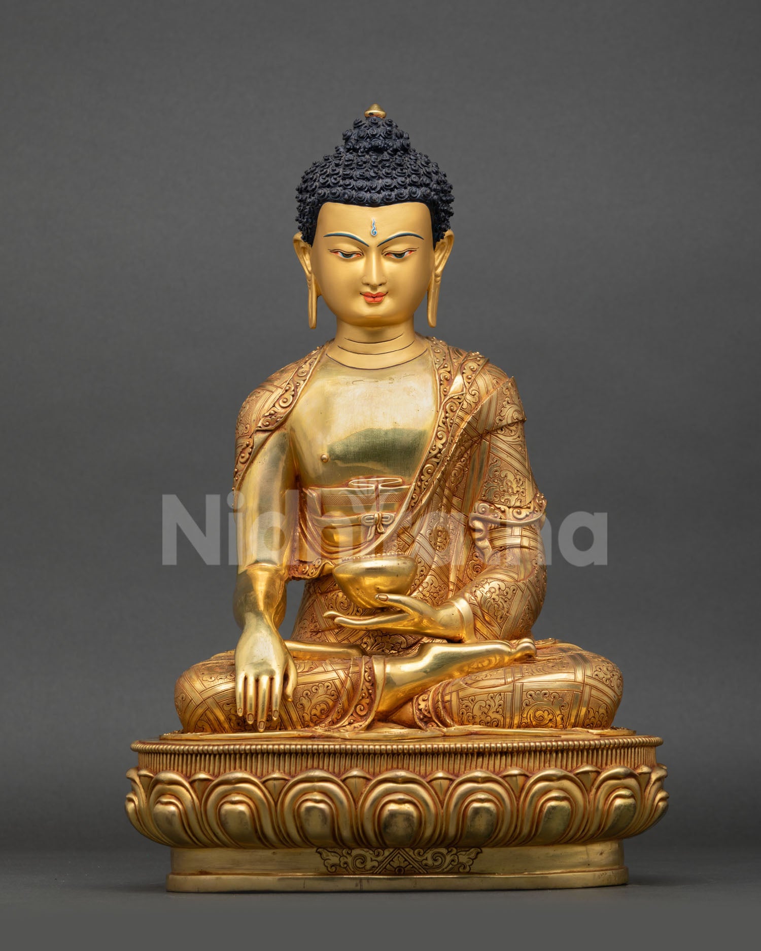 Front view of Buddha Shakyamuni Statue in 24K gold gilded copper from Nepal