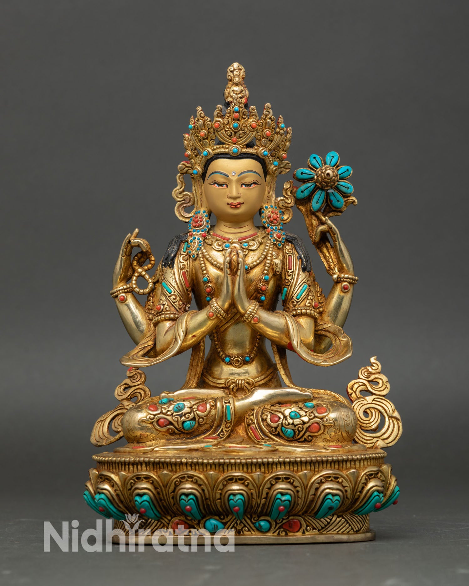 Front view of Chenrezig statue four armed Avalokiteshvara gold gilded copper Nepal