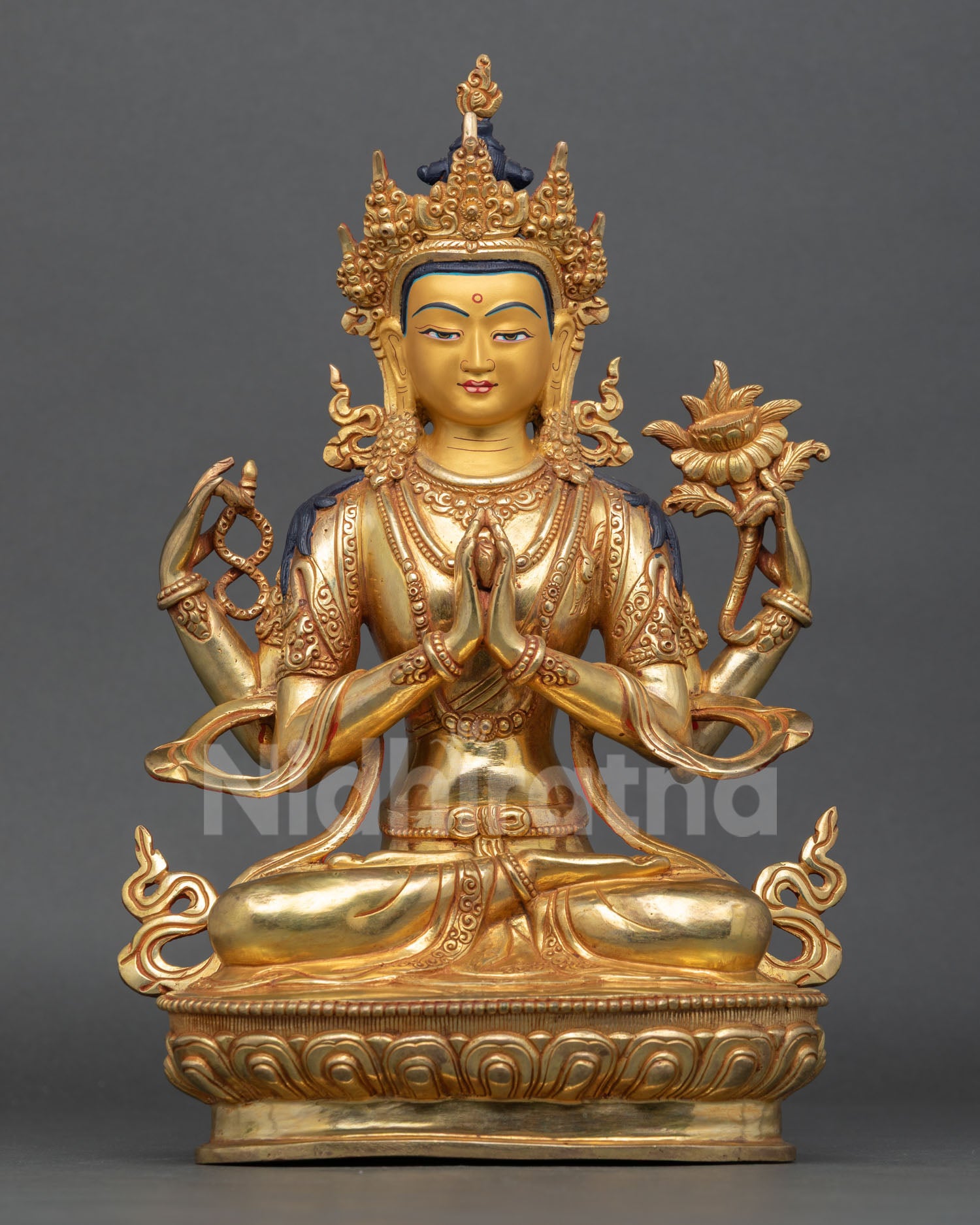Front view of Chenrezig statue, handcrafted by Newari artisan from Patan, Nepal, 24K gold detail, gold painted face