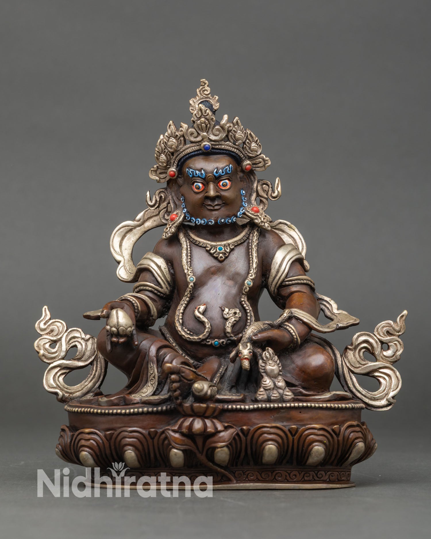 Front view Dzambhala statue oxidized silver-plated copper semi-precious stones wrathful expression