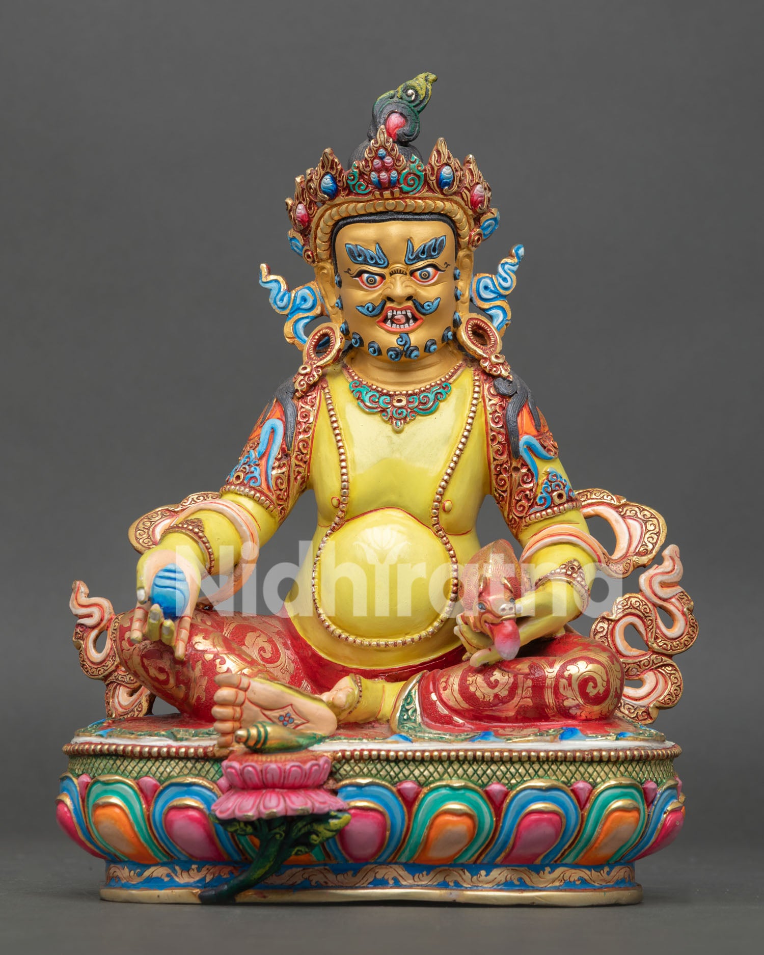 front view dzambhala statue yellow hued copper sculpture lotus seat wealth deity nepal