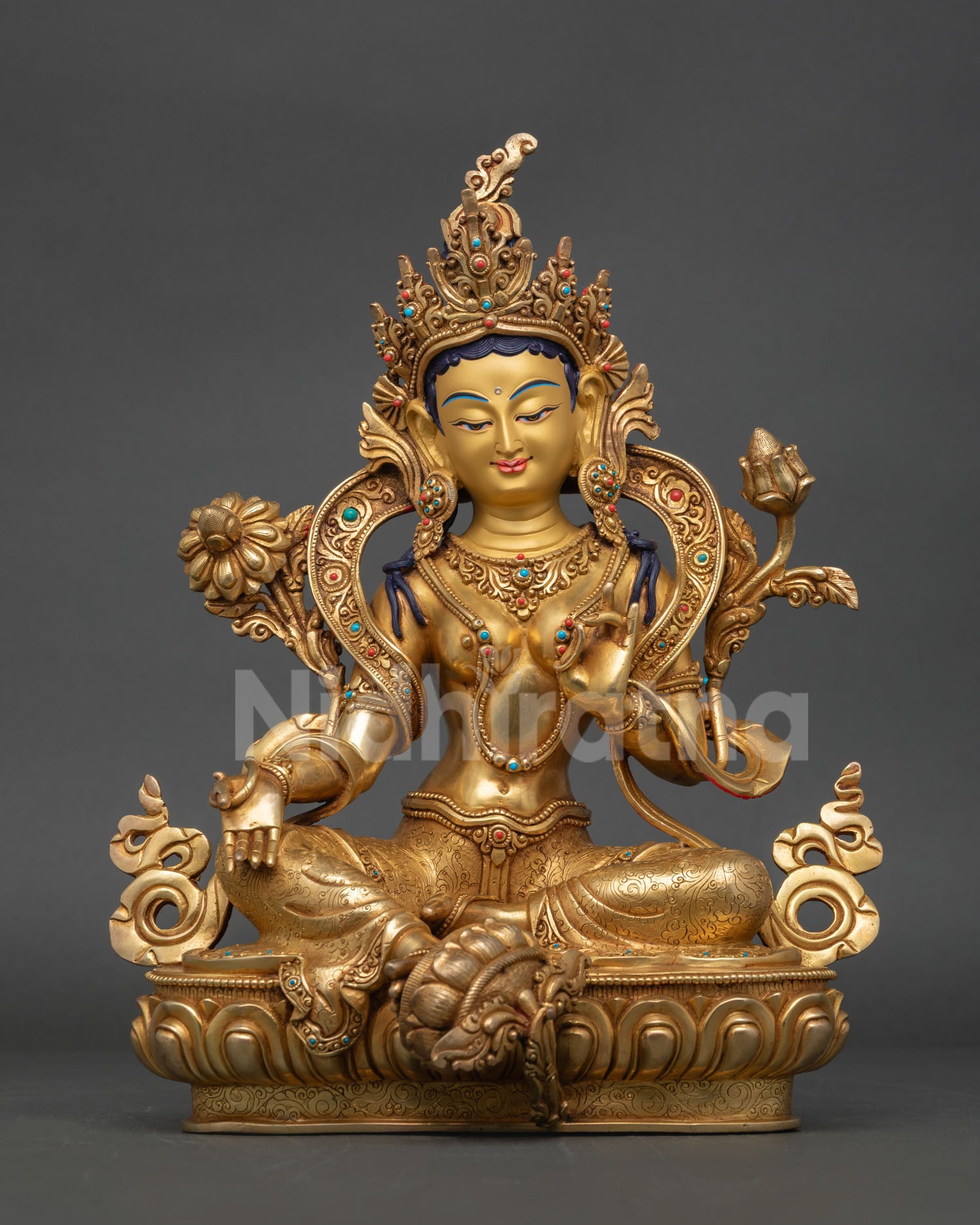 Front view of Green Tara statue, copper and 24k gold gilded buddhist sculpture with lotus pedestal