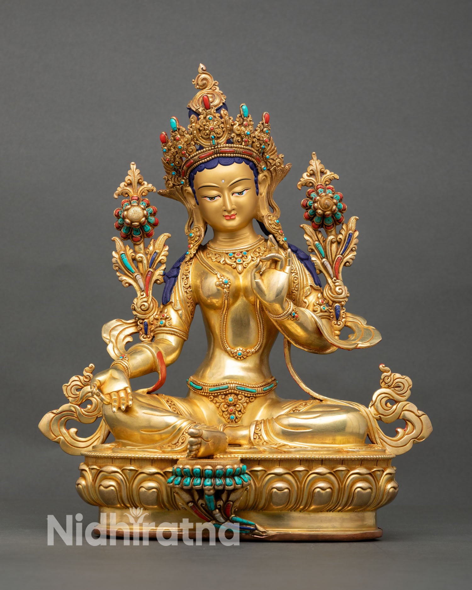 Front view of Green Tara statue handcrafted in Patan Nepal copper sculpture 24K gold detailing turquoise coral stones Buddhist goddess of compassion