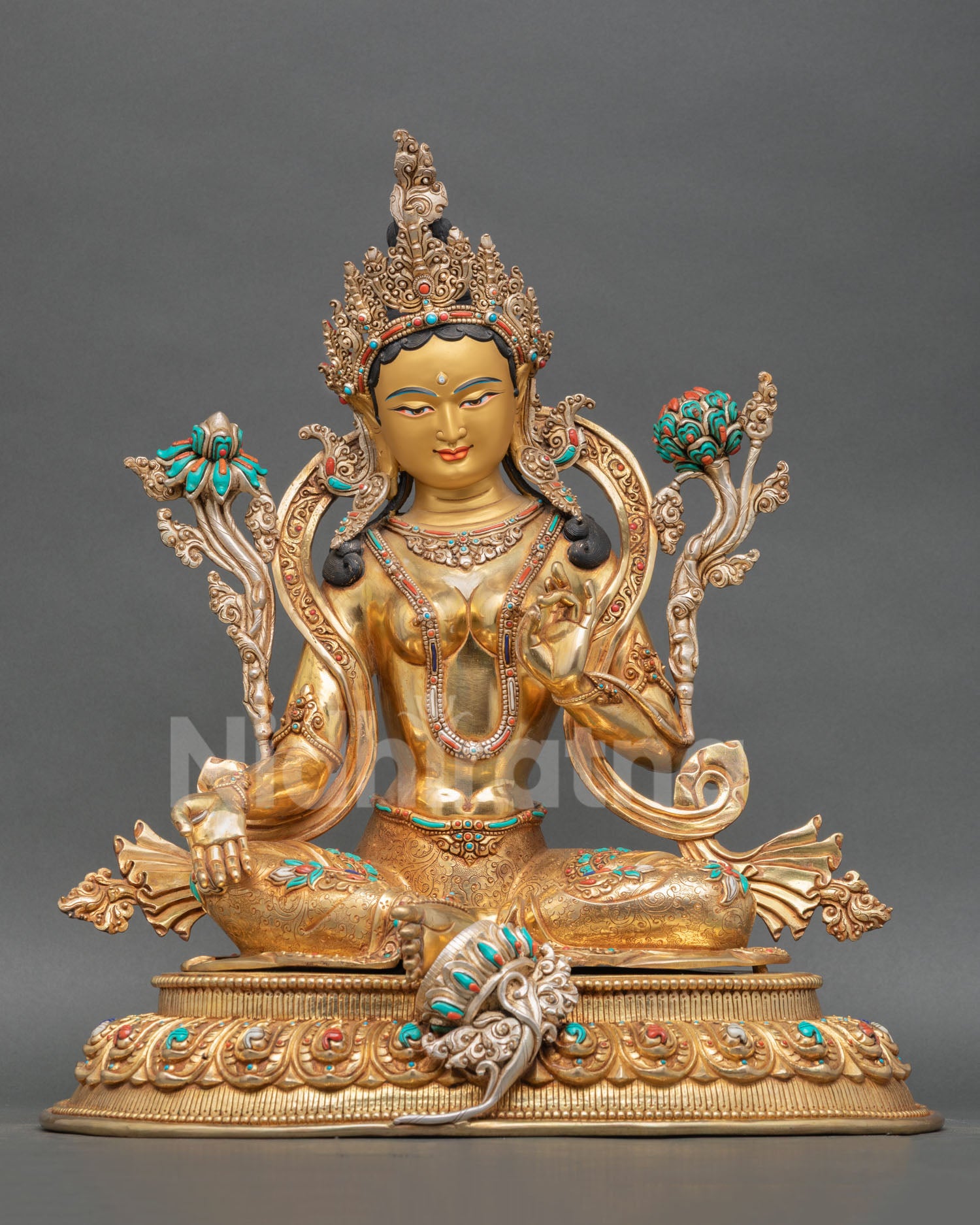 Front view of Green Tara statue with 24K gold detailing silver plated accents turquoise coral stones Nepal