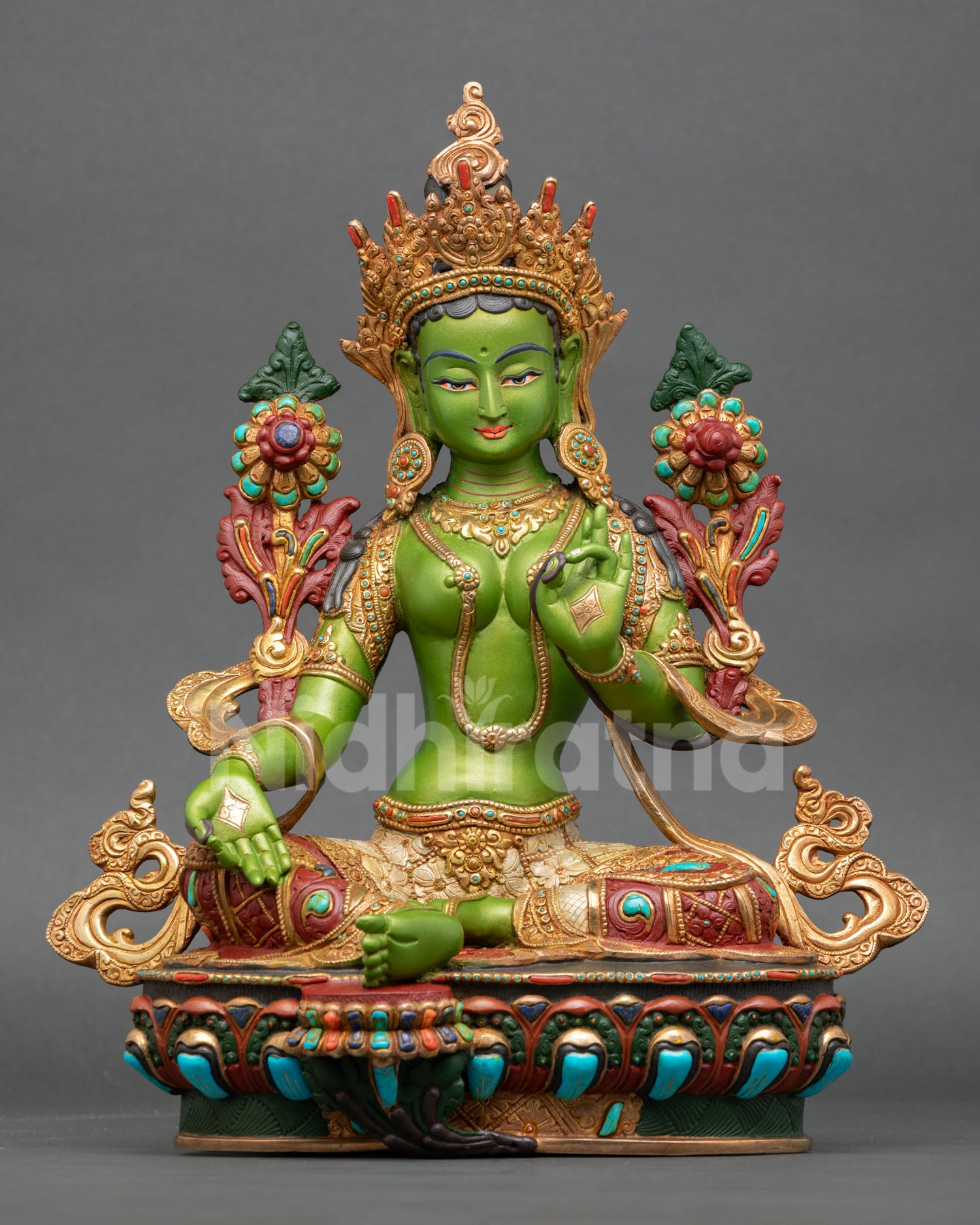 Front view of Green Tara statue with copper craftsmanship gold gilded finish and hand painted acrylic details Nepal