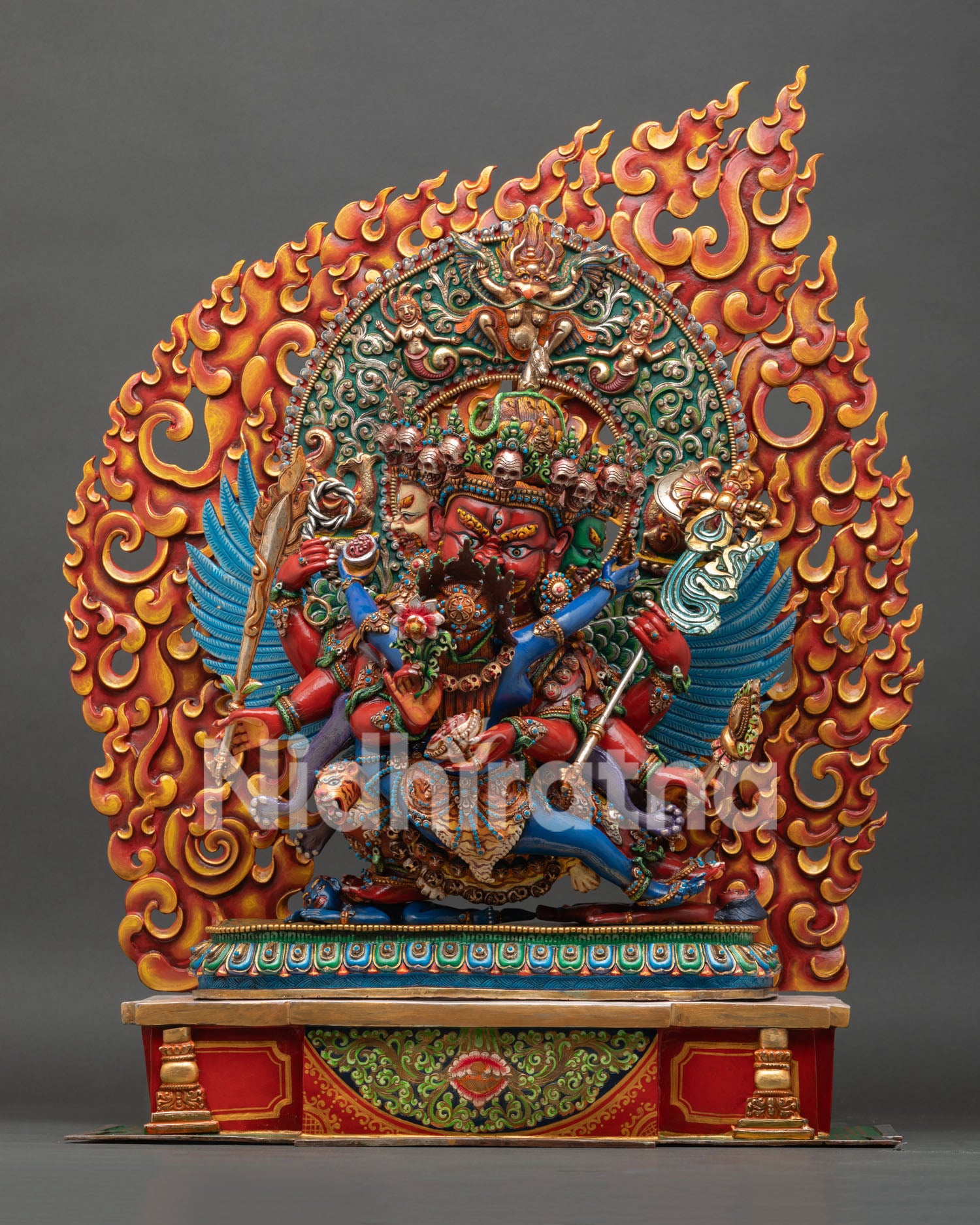 Front view of Hayagriva statue three headed form hand painted copper Himalayan sacred deity sculpture