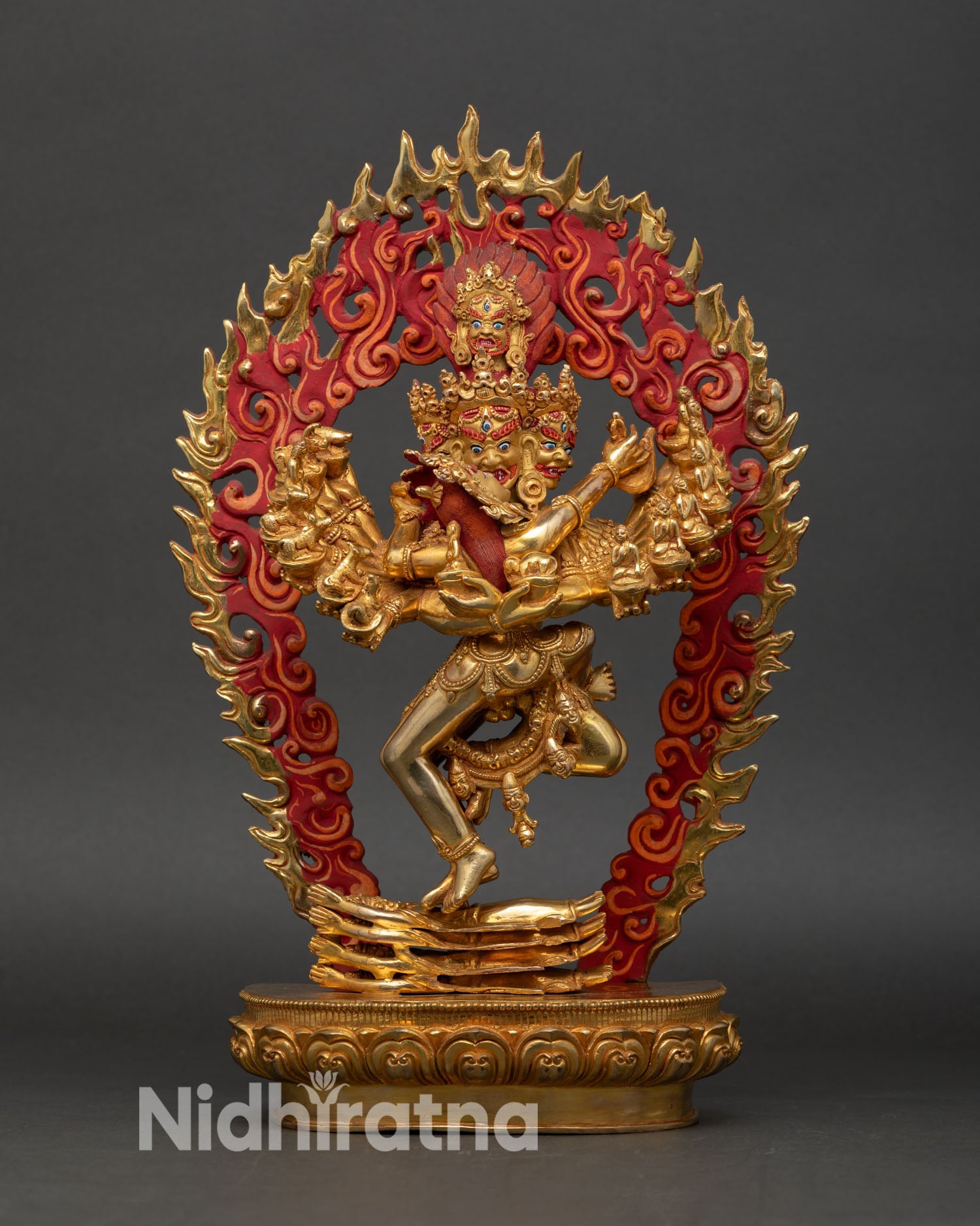 Front view Hevajra statue Patan Nepal copper gold painted face sixteen arms eight faces, lotus seat tantric Buddhist art