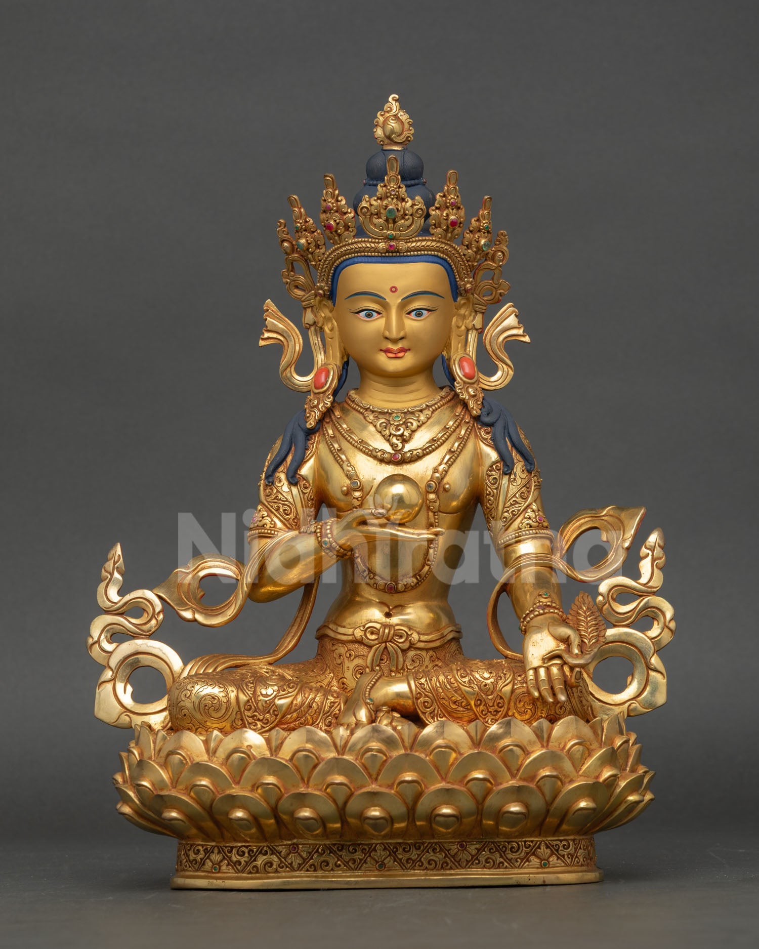 Front view of Kshitigarbha statue handcrafted in copper with 24k gold gilding, holding cintamani jewel for Buddhist altar and meditation decor.