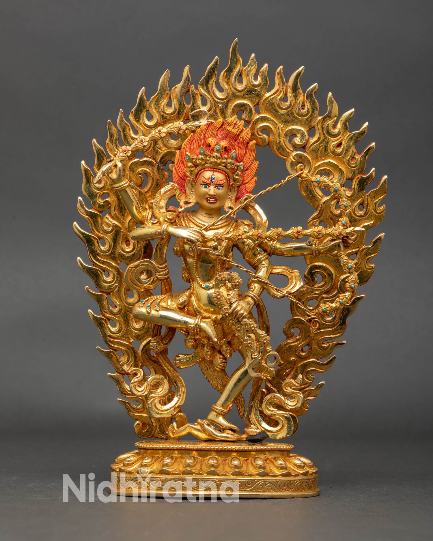 Front view of Kurukulla statue gold gilded copper lotus throne Nepalese art