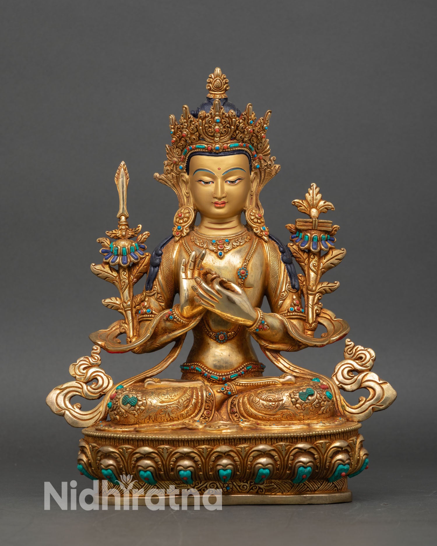 Front view of Manjushree statue 24K gold accented copper lotus pedestal Buddhist art