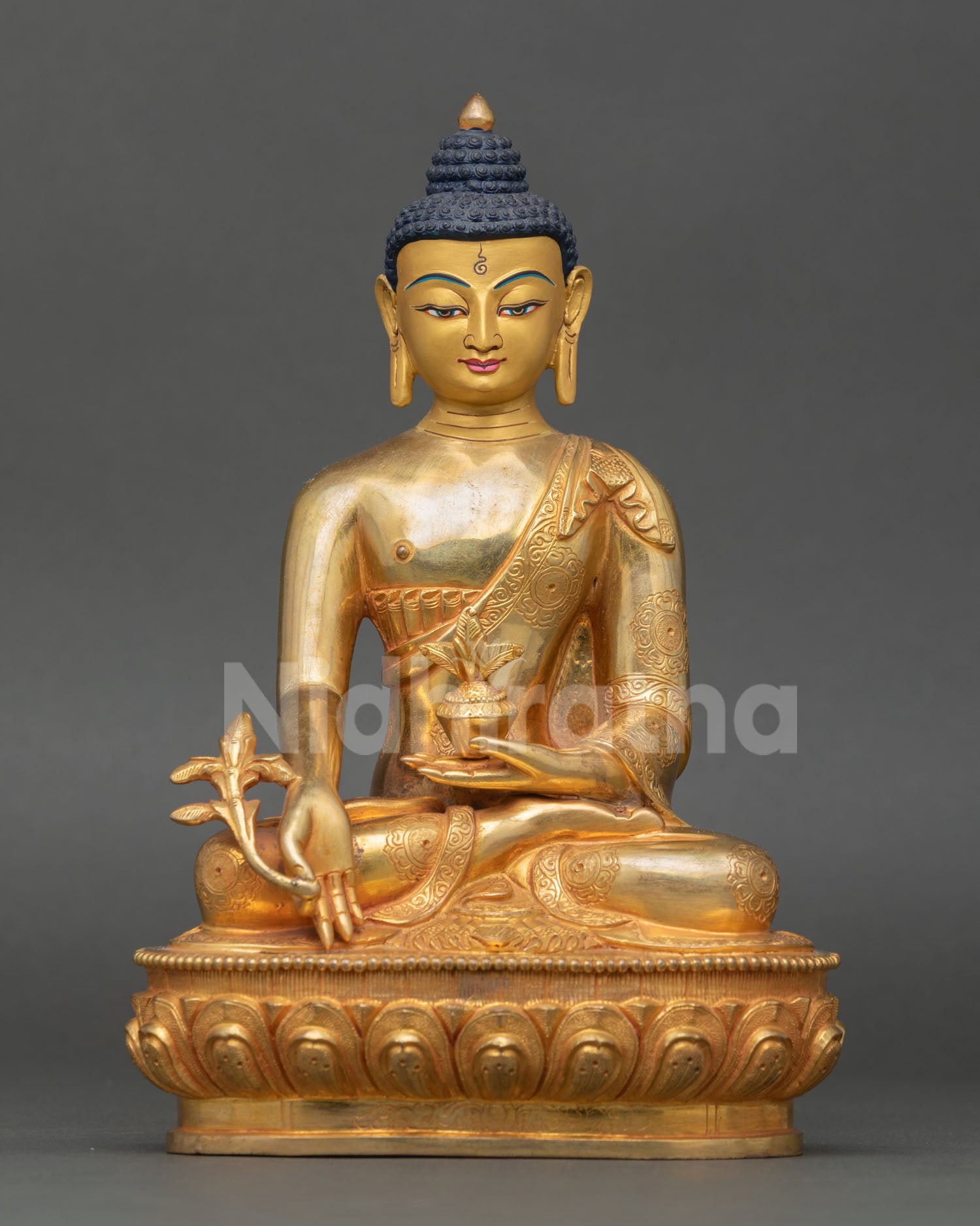 Front view of Medicine Buddha statue handcrafted Nepal copper 24K gold gilded healing Buddha seated meditation posture lost wax casting